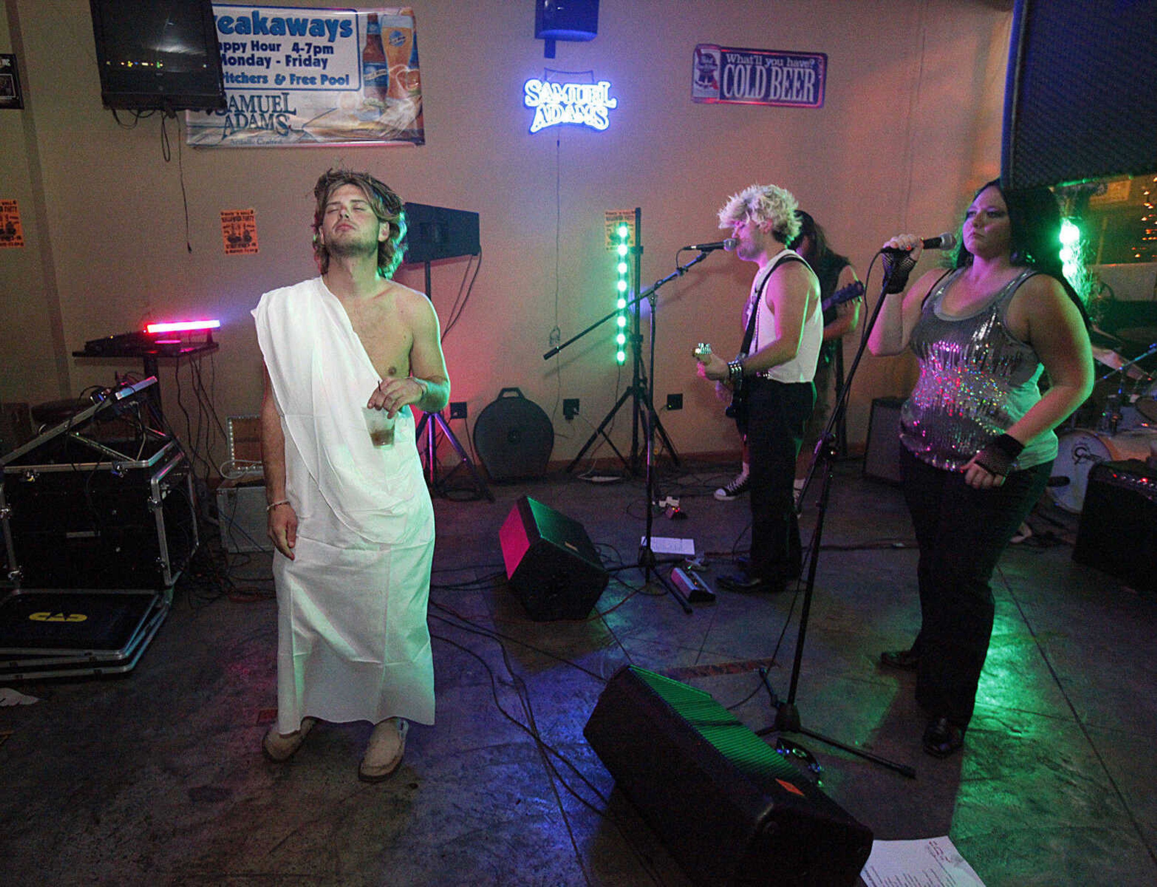 CHRIS MACKLER ~ photos@semissourian.com

A man dressed as Jesus dances to the music at Breakaway's in Cape Girardeau on Saturday, Oct. 30, 2010.