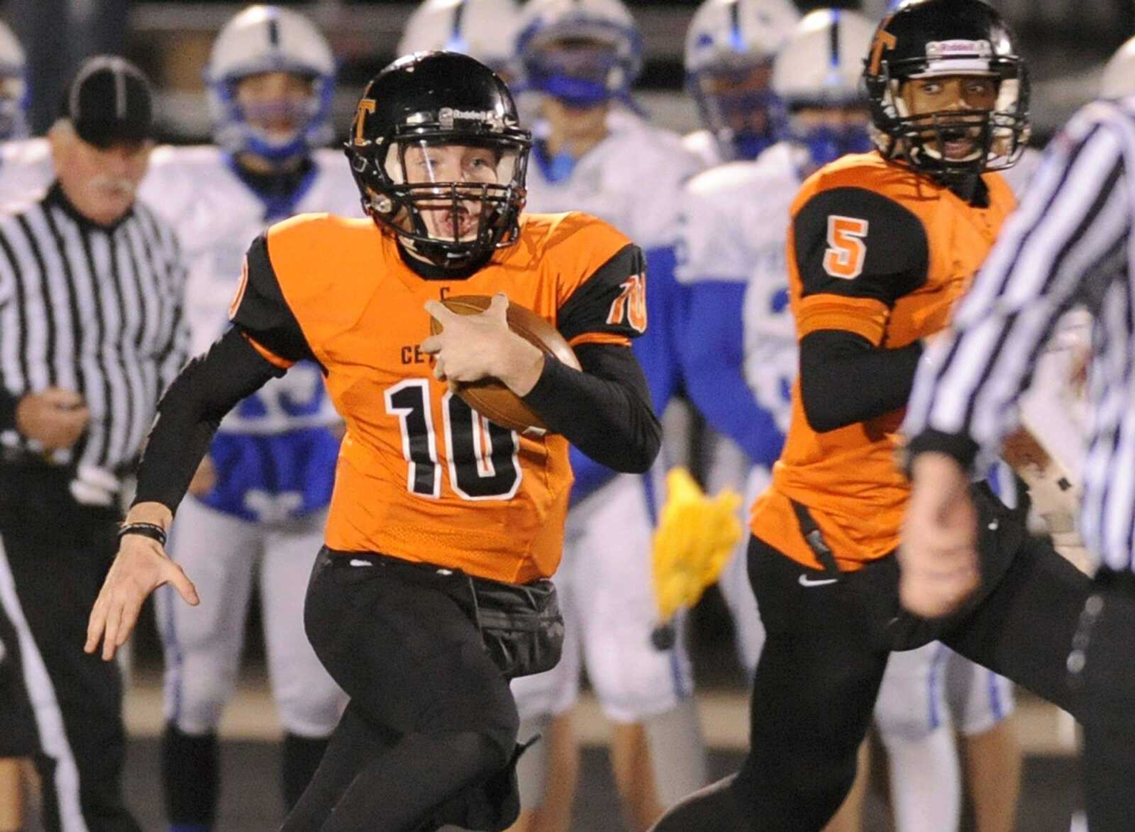 Central quarterback Peyton Montgomery runs for a touchdown in the fourth quarter against Hillsboro during the Class 4 District 1 championship Friday, Nov. 7, 2014 at Central. (Glenn Landberg)