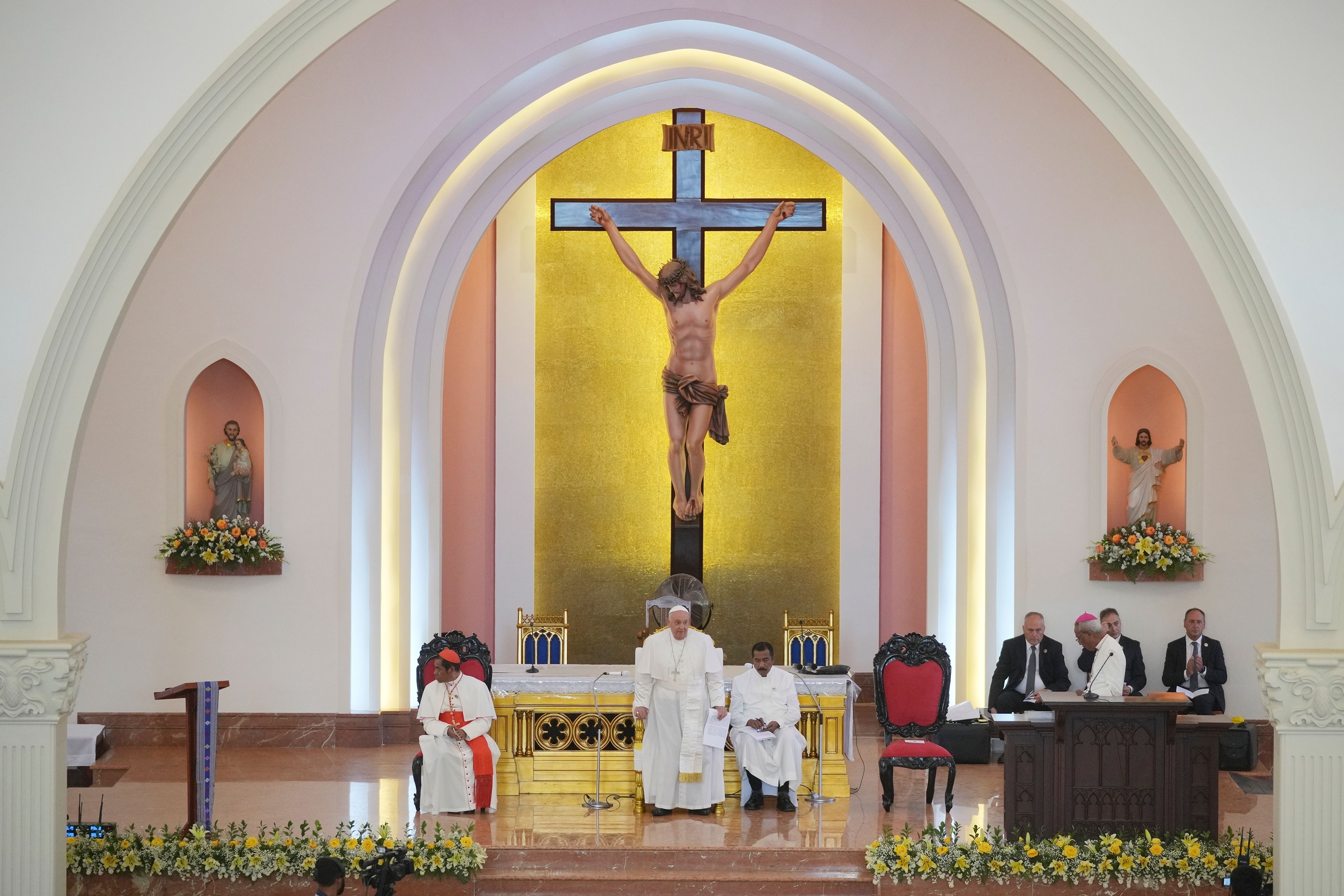 Pope Francis leads the holy mass at the Cathedral of the Immaculate Conception in Dili, East Timor, Tuesday, Sept. 10, 2024. (AP Photo/Dita Alangkara)