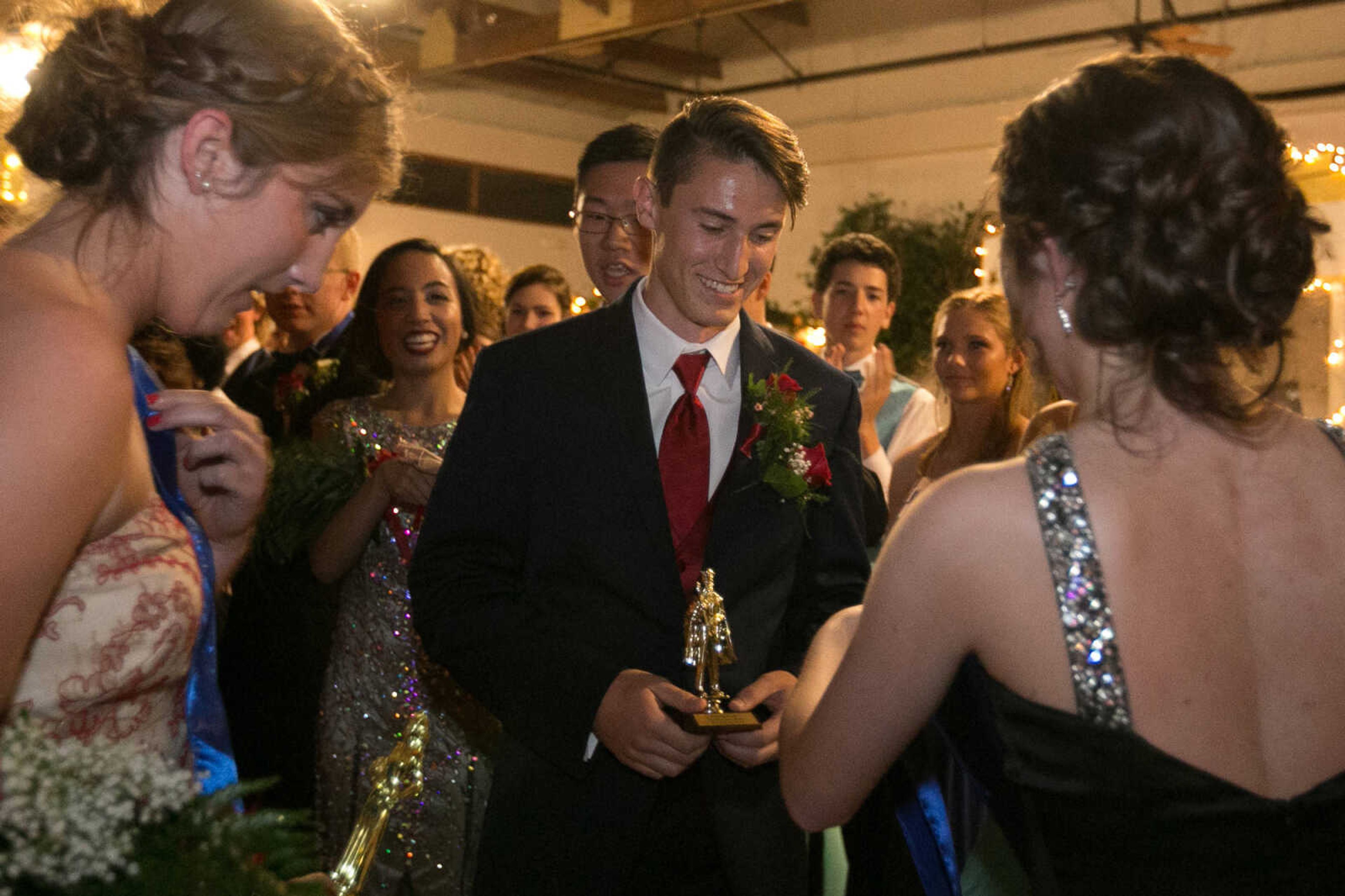 GLENN LANDBERG ~ glandberg@semissourian.com

Students take to the dance floor during the Notre Dame Regional High School prom, "Red Carpet Gala," Friday, April 29, 2016 at Bavarian Halle in Jackson.