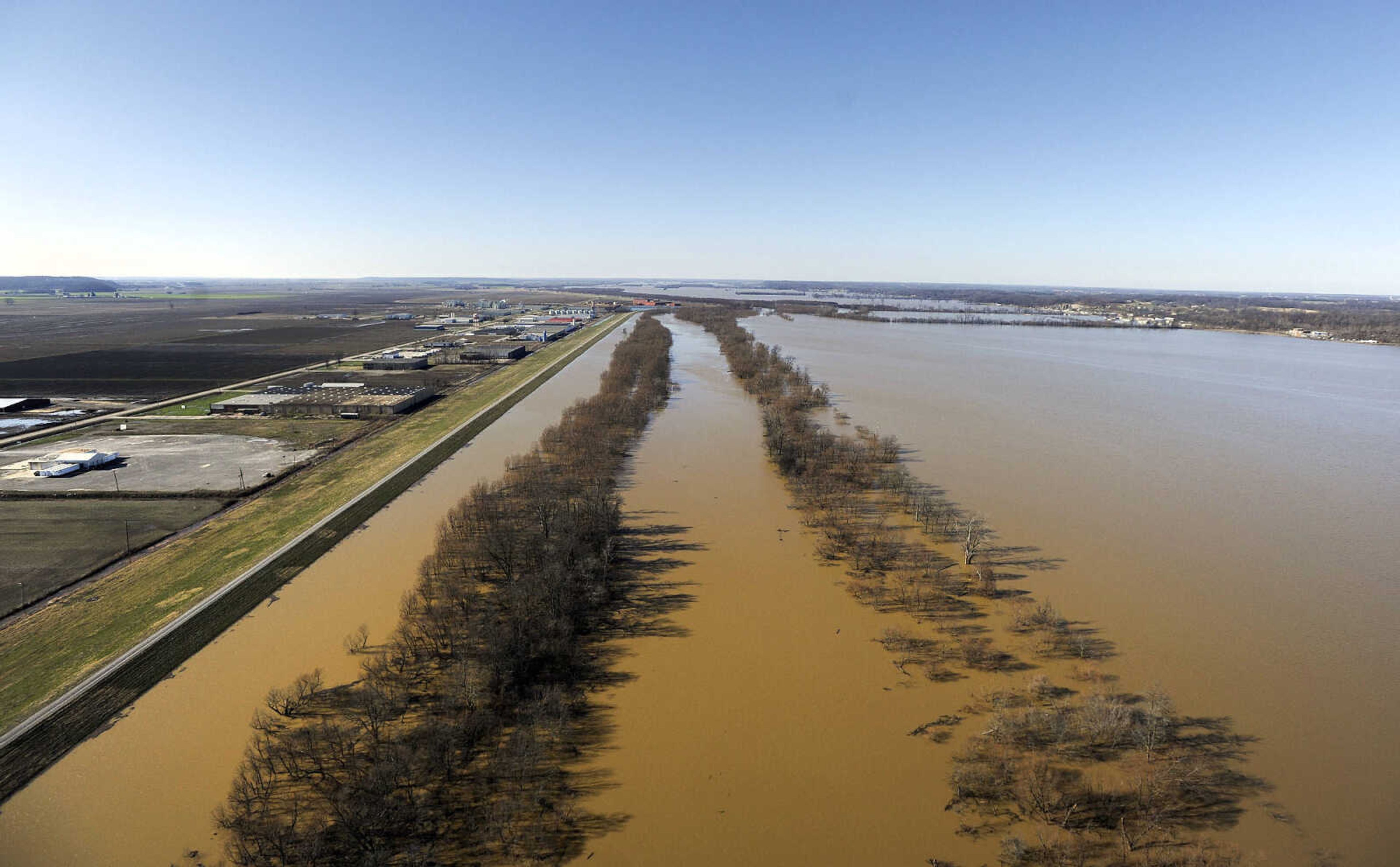 LAURA SIMON ~ lsimon@semissourian.com

Floodwater from the Diversion Channel spreads across the horizon near Cape Girardeau, Saturday, Jan. 2, 2016.