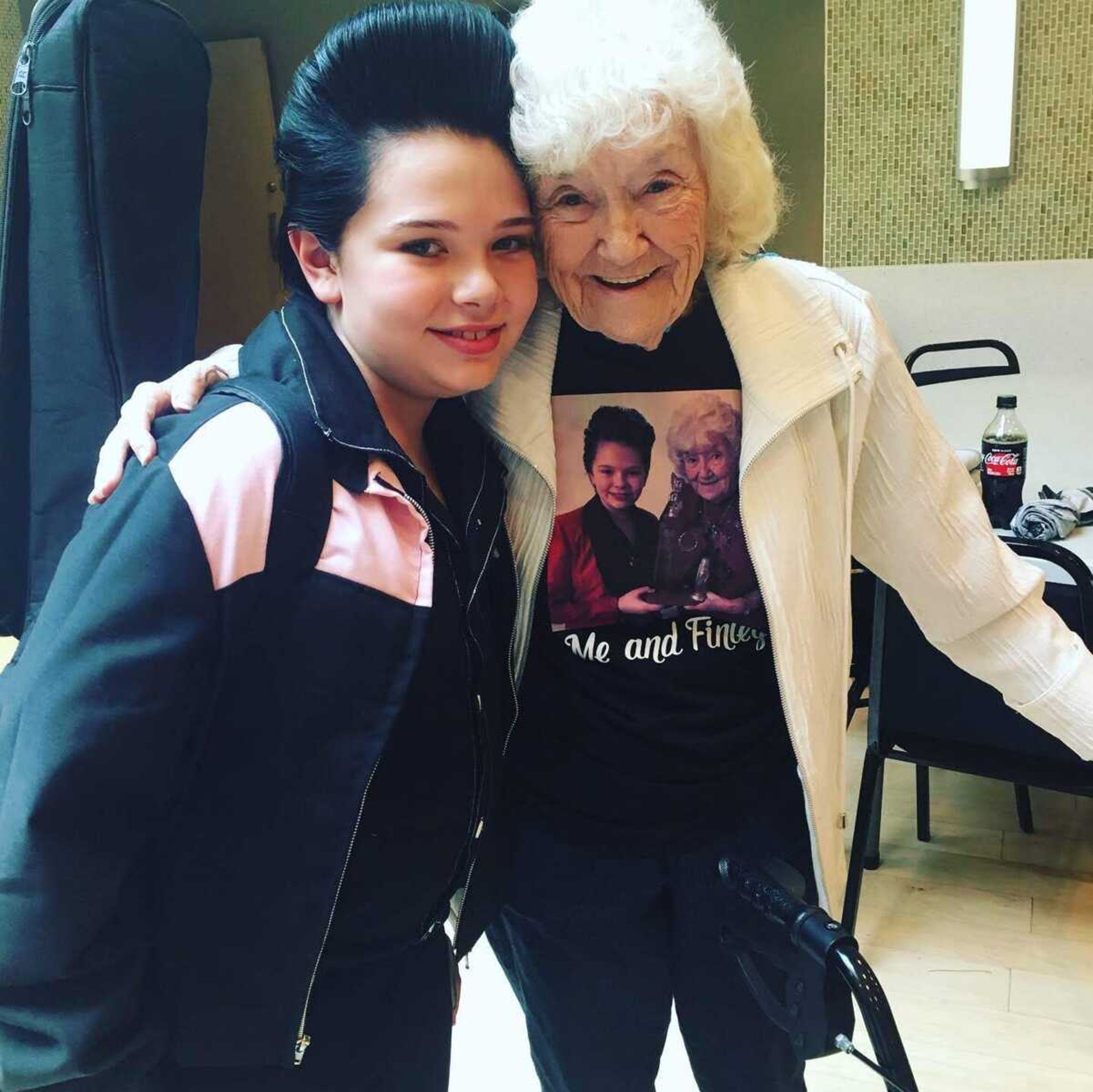 Finley Watkins poses for a photo with the late Louise Smith in June during the Tupelo Elvis Festival in Tupelo, Mississippi.