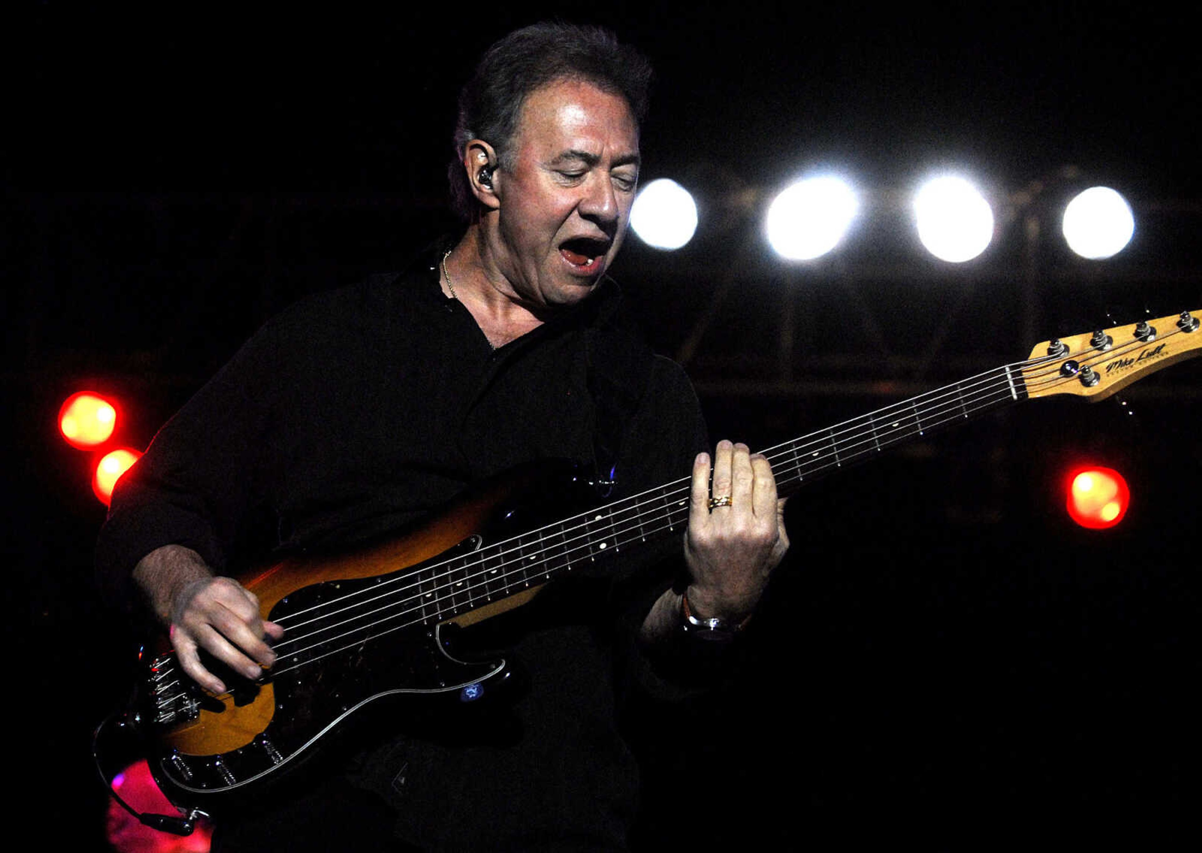 LAURA SIMON ~ lsimon@semissourian.com
Creedence Clearwater Revisited rocks the grandstand at Arena Park Friday, September 16, 2011 during the SEMO District Fair in Cape Girardeau.