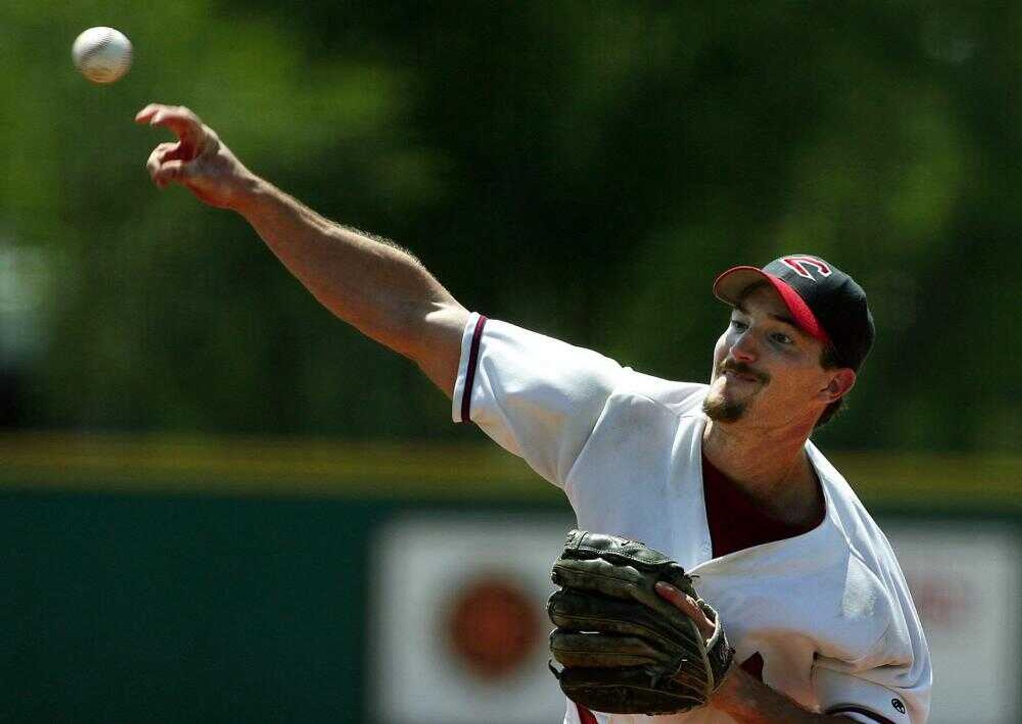 WICHITA, KS - AUGUST 4, 2006: Plaza Tire Capahas starting pitcher Chad Boganpohl makes a pitch against Rock City Redsox of Roxboro, NC during the 72nd National Baseball Congress World Series at Word of Life Stadium in Wichita, Kansas on Friday, August 4, 2006. Boganpohl pitched a no hitter for seven innings and only giving up one run and two hits in the eighth. PHOTO BY LARRY W. SMITH