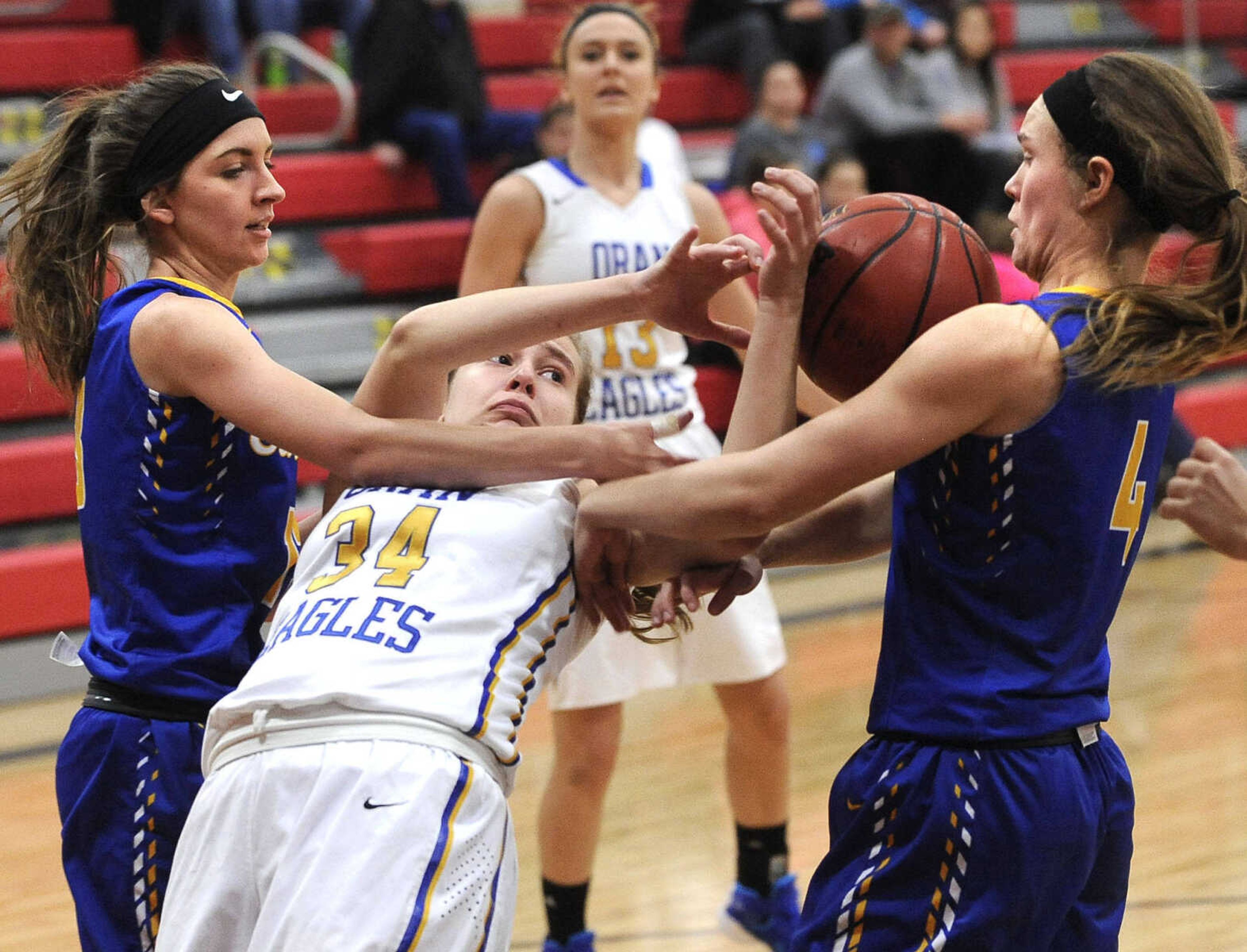 FRED LYNCH ~ flynch@semissourian.com
Oran's Hannah Scherer gets tangled between Scott City's Hannah Shemonia, left, and Bella Bowers during the first quarter of a first-round game in the Scott-Mississippi Conference Tournament on Tuesday, Jan. 12, 2016 in Chaffee, Missouri.