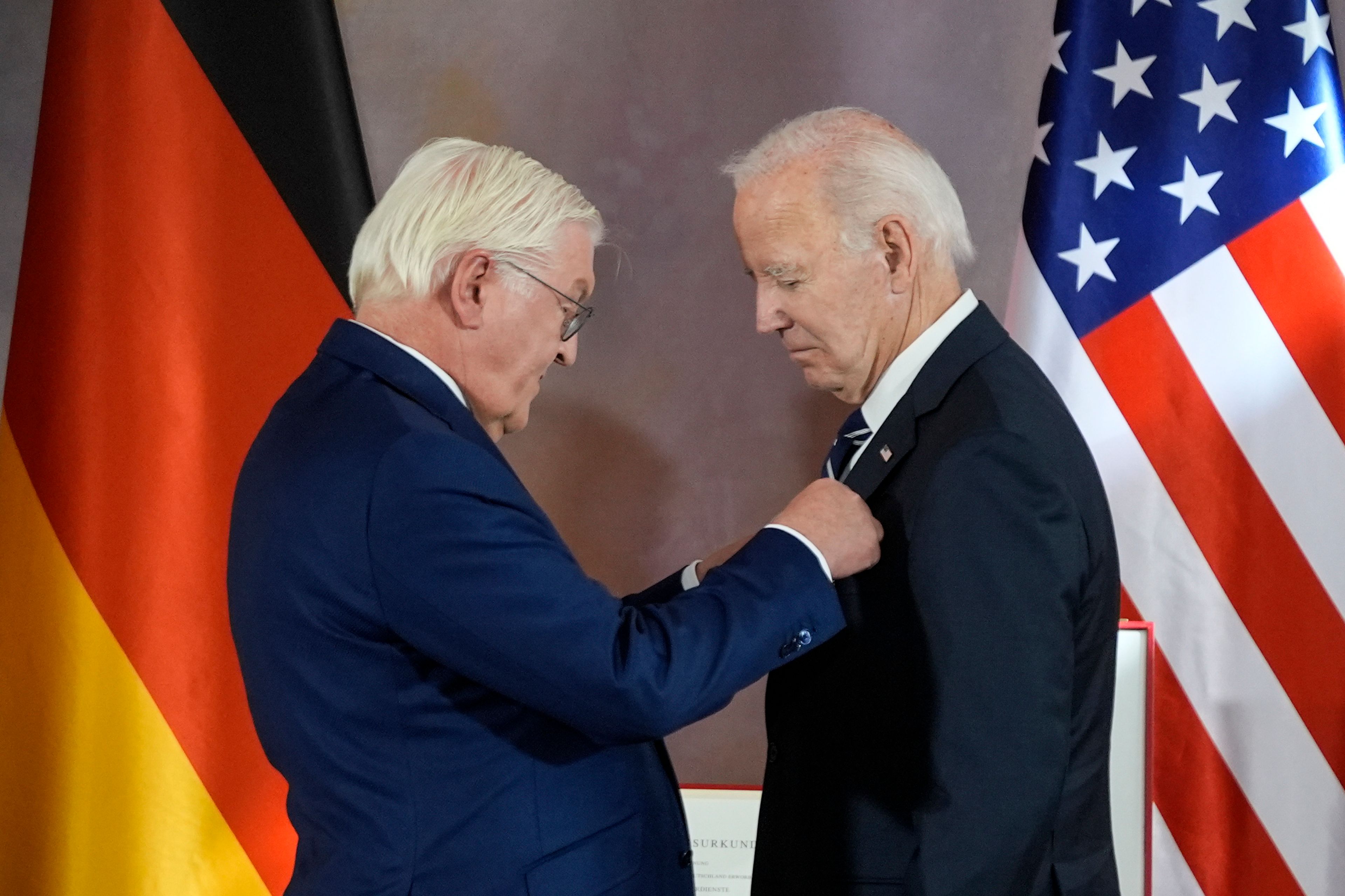 President Joe Biden receives Germany's Grand Cross special class of the Order of Merit by German President Frank-Walter Steinmeier at Bellevue Palace in Berlin, Germany, Friday, Oct. 18, 2024. (AP Photo/Matthias Schrader)