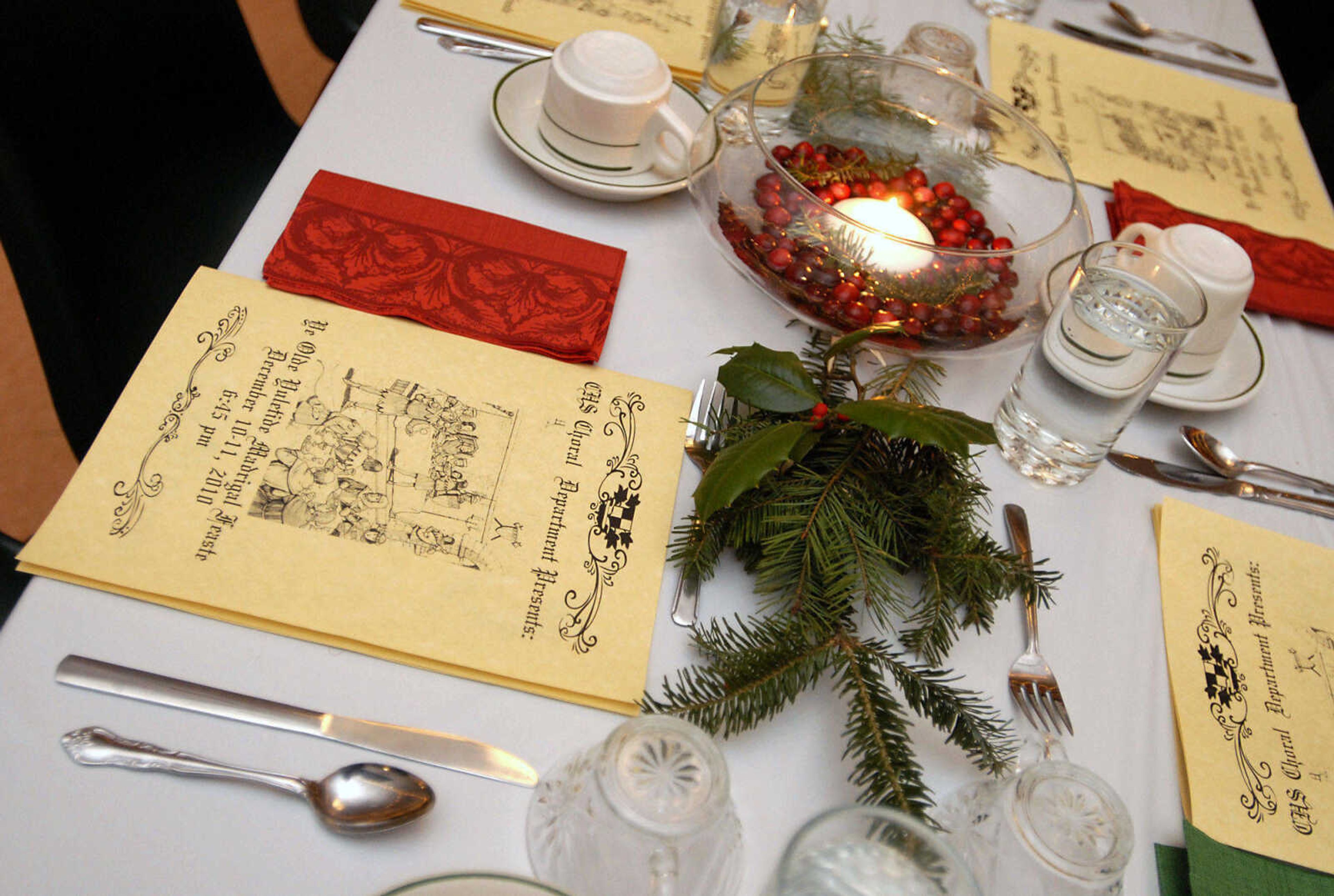 KRISTIN EBERTS ~ keberts@semissourian.com

Festive table settings awaited guests during the Central High School Choral Department's "Ye Olde Yuletide Madrigal Feaste," on Friday, Dec. 10, 2010, in Cape Girardeau. Students provided singing, food and entertainment as they transported guests back to Christmas in Renaissance England.