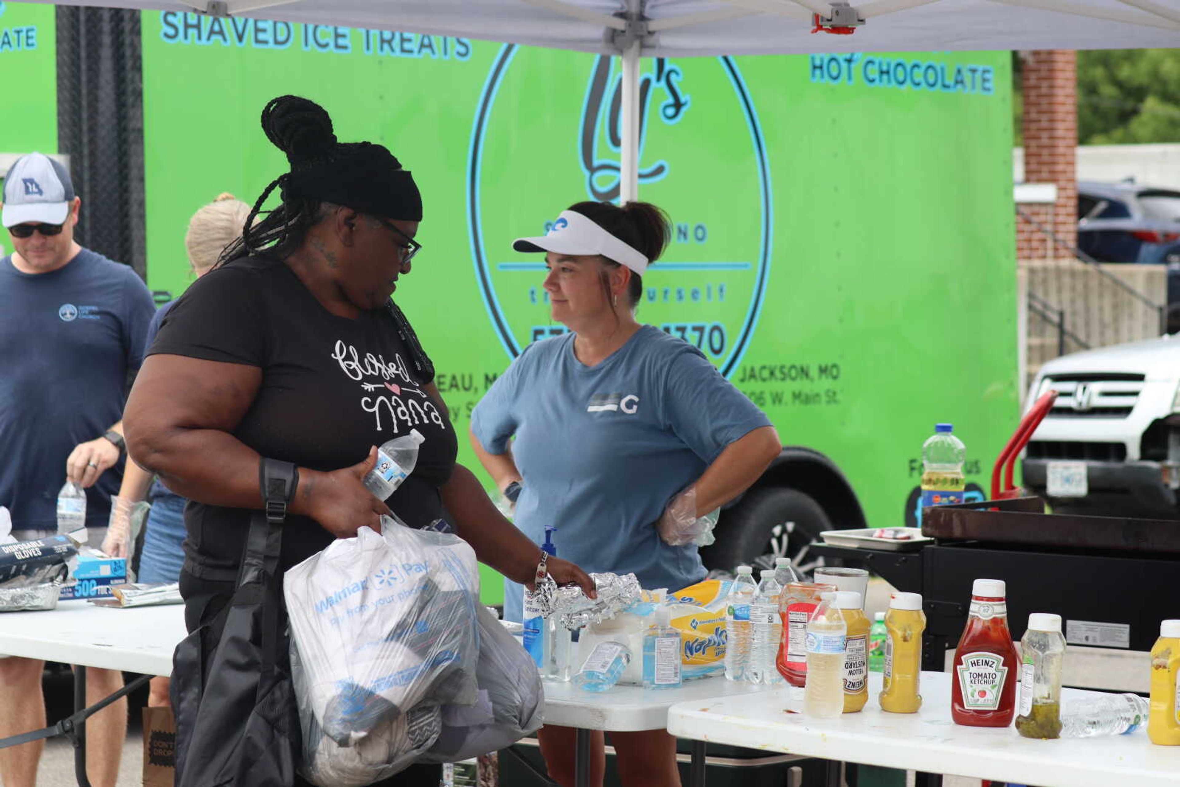 A person goes through the line to get refreshments at the Back to School Bash.