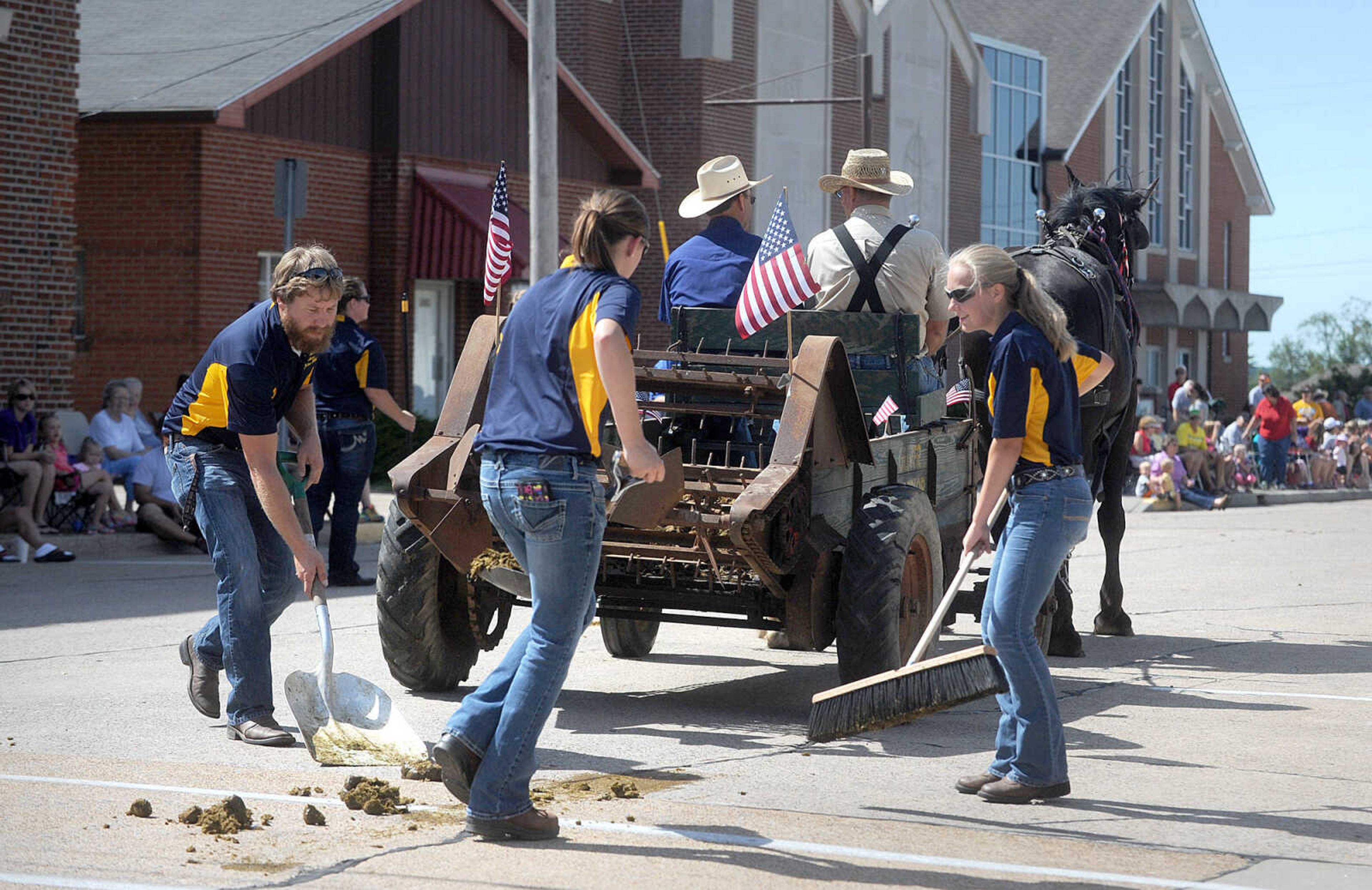 LAURA SIMON ~ lsimon@semissourian.com


A cleanup crew follows behind the old-time horse drawn carriages down High Street in Jackson, Saturday, July 5, 2014, during the Bicentennial Wagon Trail Parade.