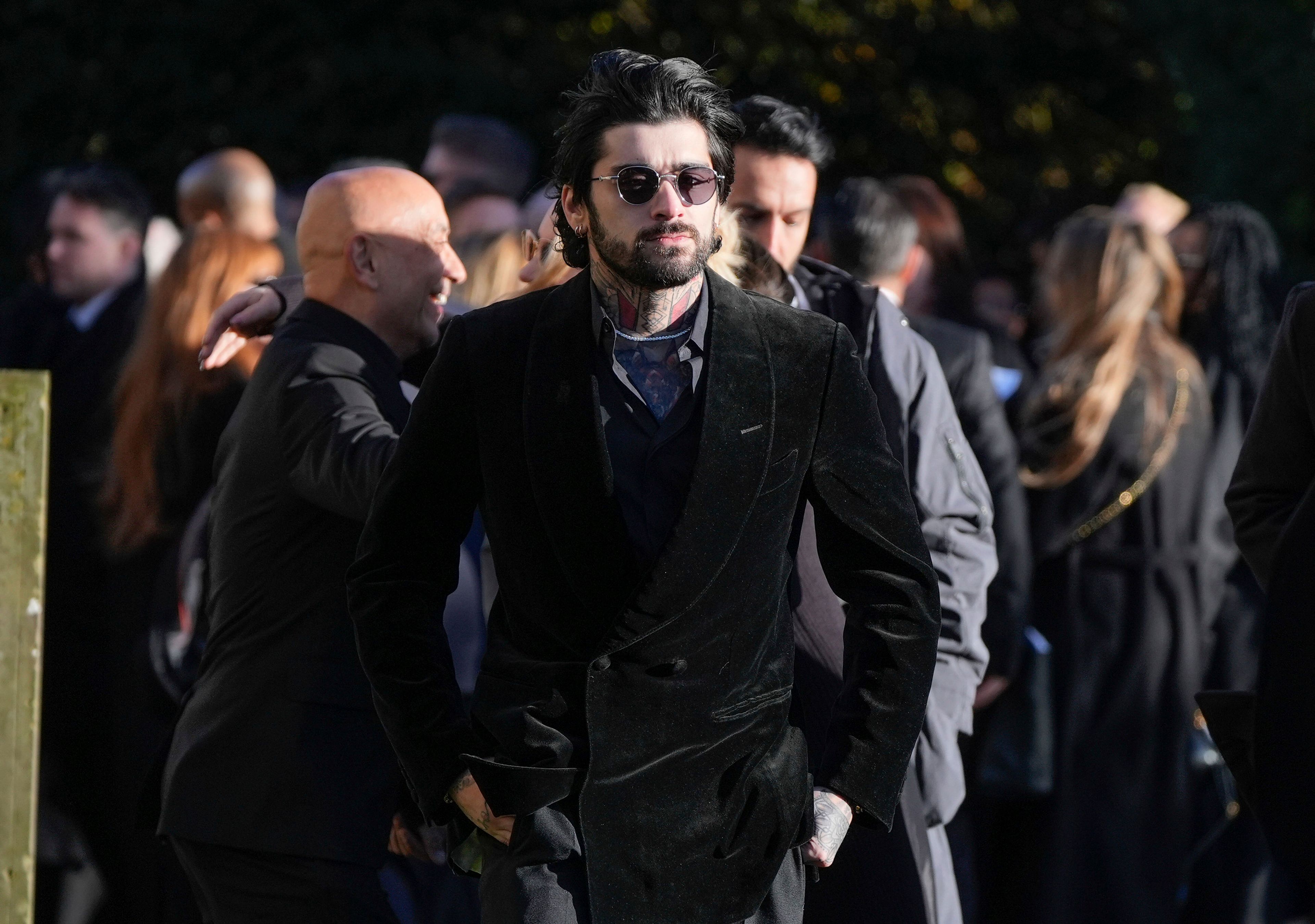 Zayn Malik walks after the funeral service for One Direction singer Liam Payne at St Mary's Church in Amersham, England, Wednesday, Nov. 20, 2024. (Andrew Matthews/PA via AP)