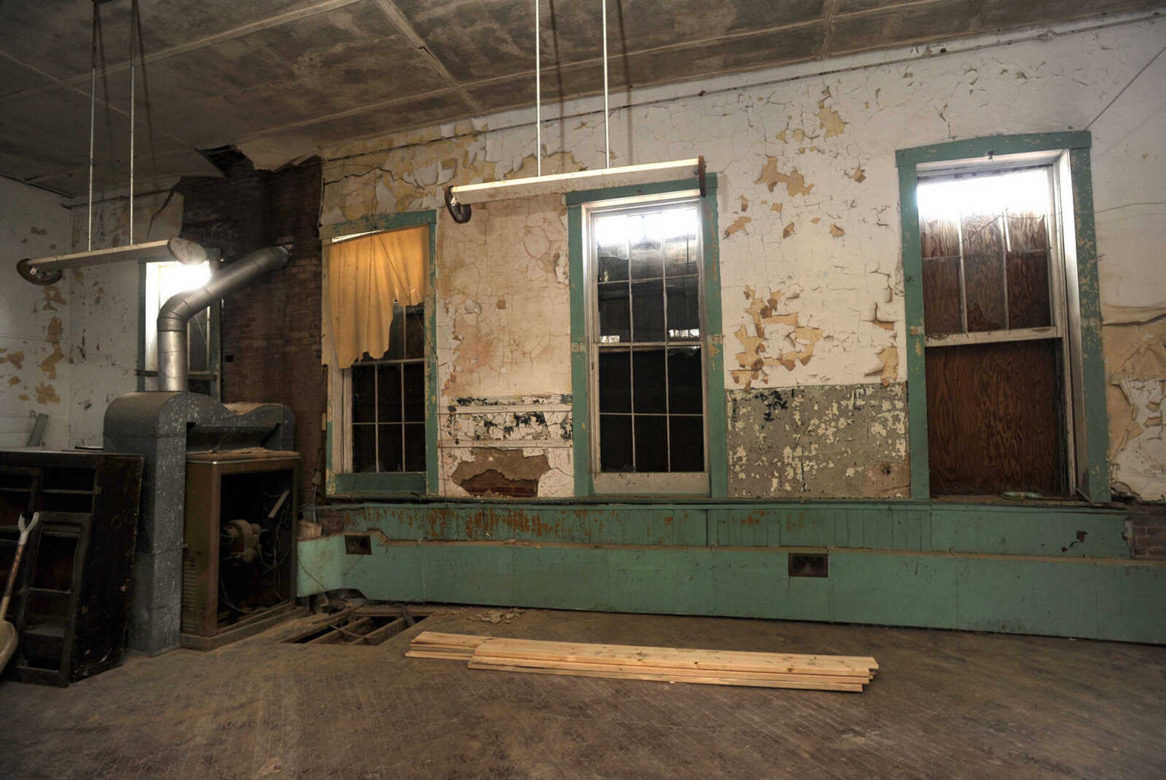 A wall in the classroom area at the old Kage School is seen Monday, March 24, 2014 in Cape Girardeau.