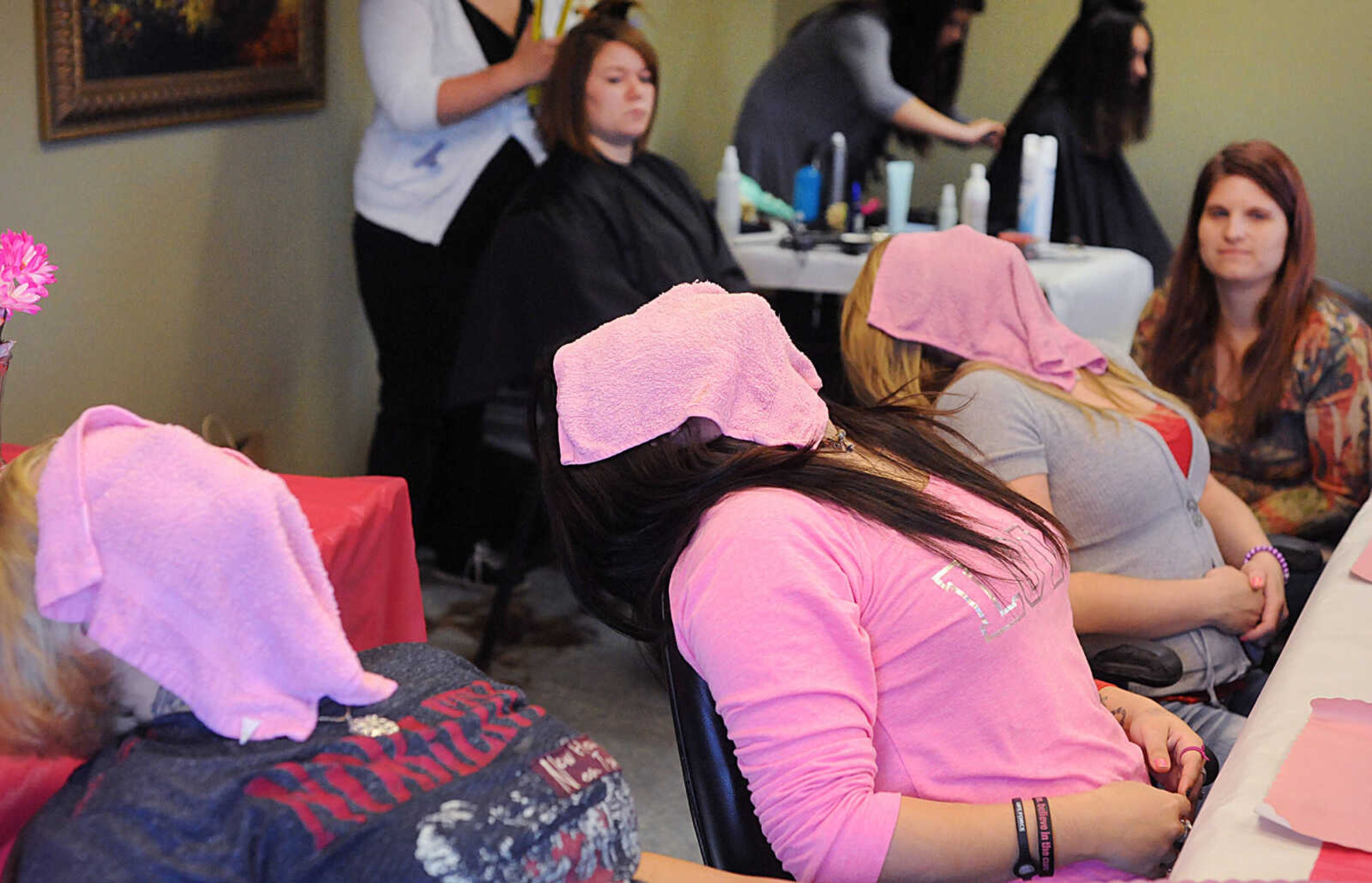 LAURA SIMON ~ lsimon@semissourian.com

Women in Gibson Recovery Center Inc.'s Vision House relax with a wet towel at the beginning of their makeup session with Mary Kay consultant Jana Jateff, Wednesday, Oct. 29, 2014.