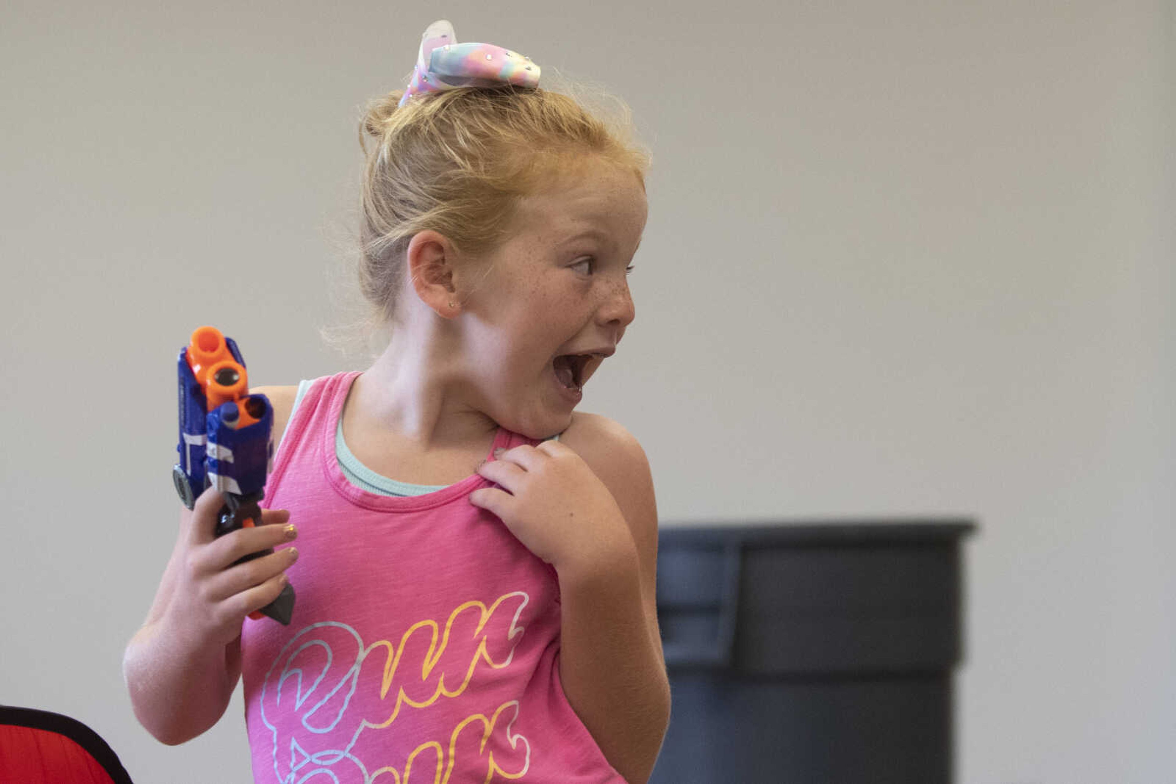 Cambri Huskey, 7, of Jackson, plays with other children during the 19th annual Parks and Rec Day on Wednesday, July 10, 2019, at the Osage Centre in Cape Girardeau.