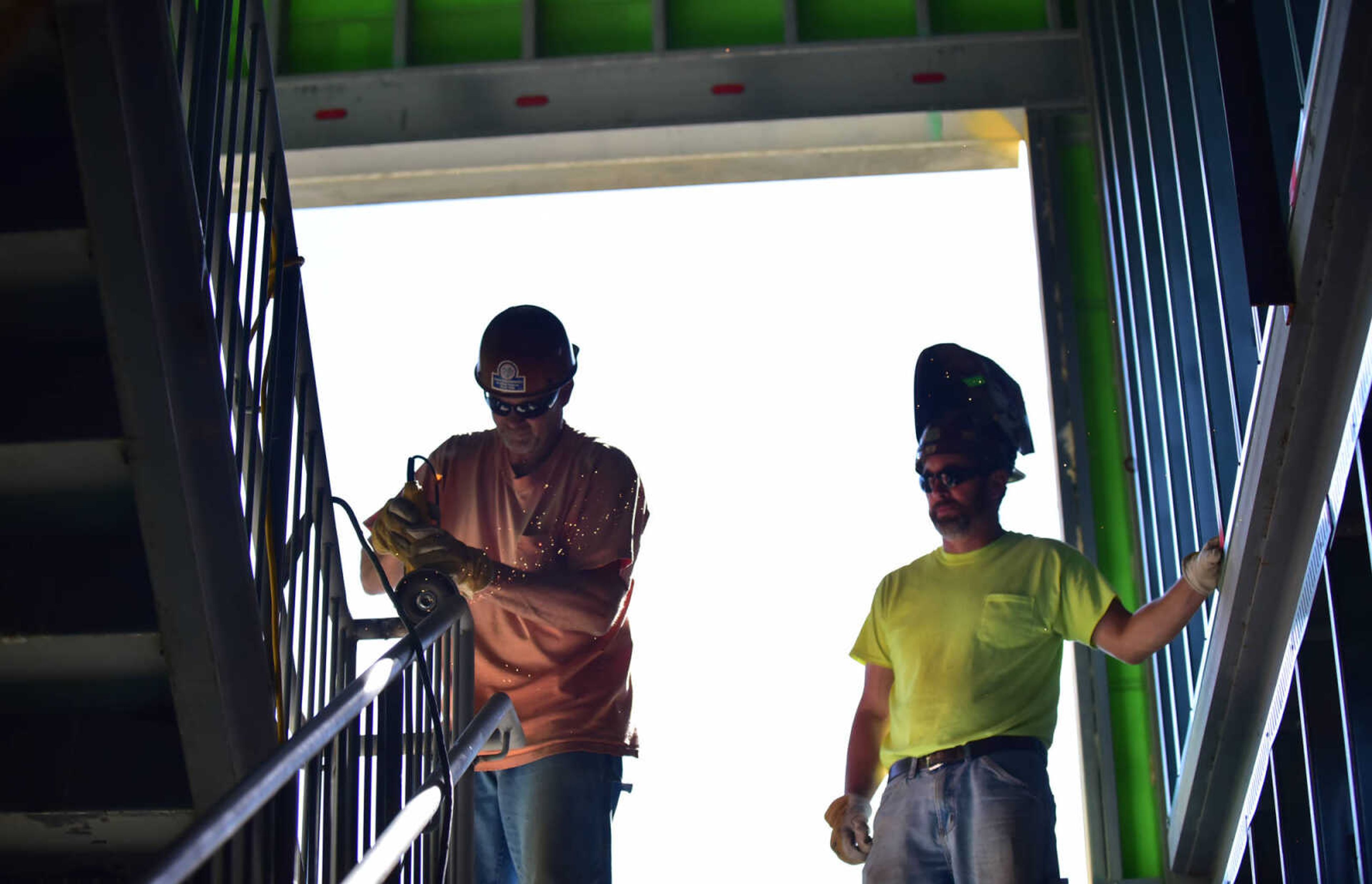 ANDREW J. WHITAKER ~ awhitaker@semissourian.com
Dave Lewis, left, and Tom Chockley, right, weld a railing together while working on the Career Technology Center extension building Monday, Oct. 17, 2016 in Cape Girardeau.