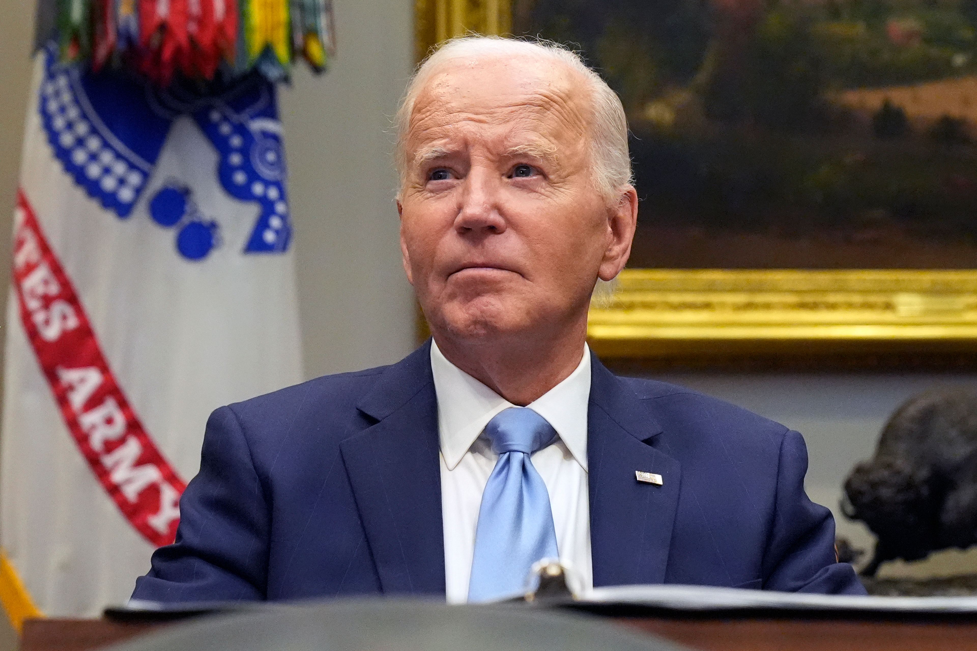 President Joe Biden listens during a briefing on the government's response to Hurricane Helene in the Roosevelt Room of the White House in Washington, Tuesday, Oct. 1, 2024. (AP Photo/Mark Schiefelbein)