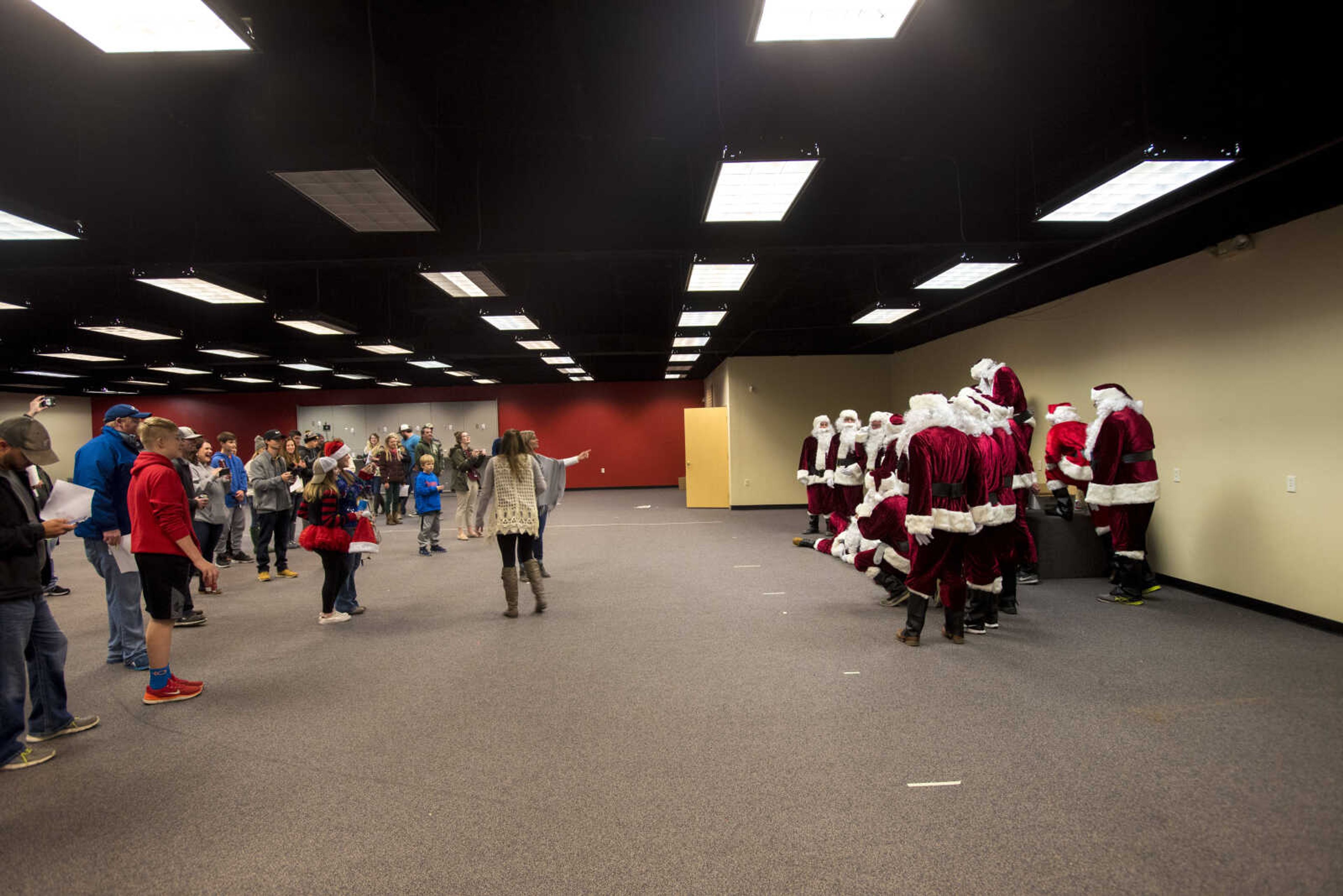 A group of Santa's get their picture taken during the Jaycee Toybox delivery on Thursday, Dec. 21, 2017, in Cape Girardeau.