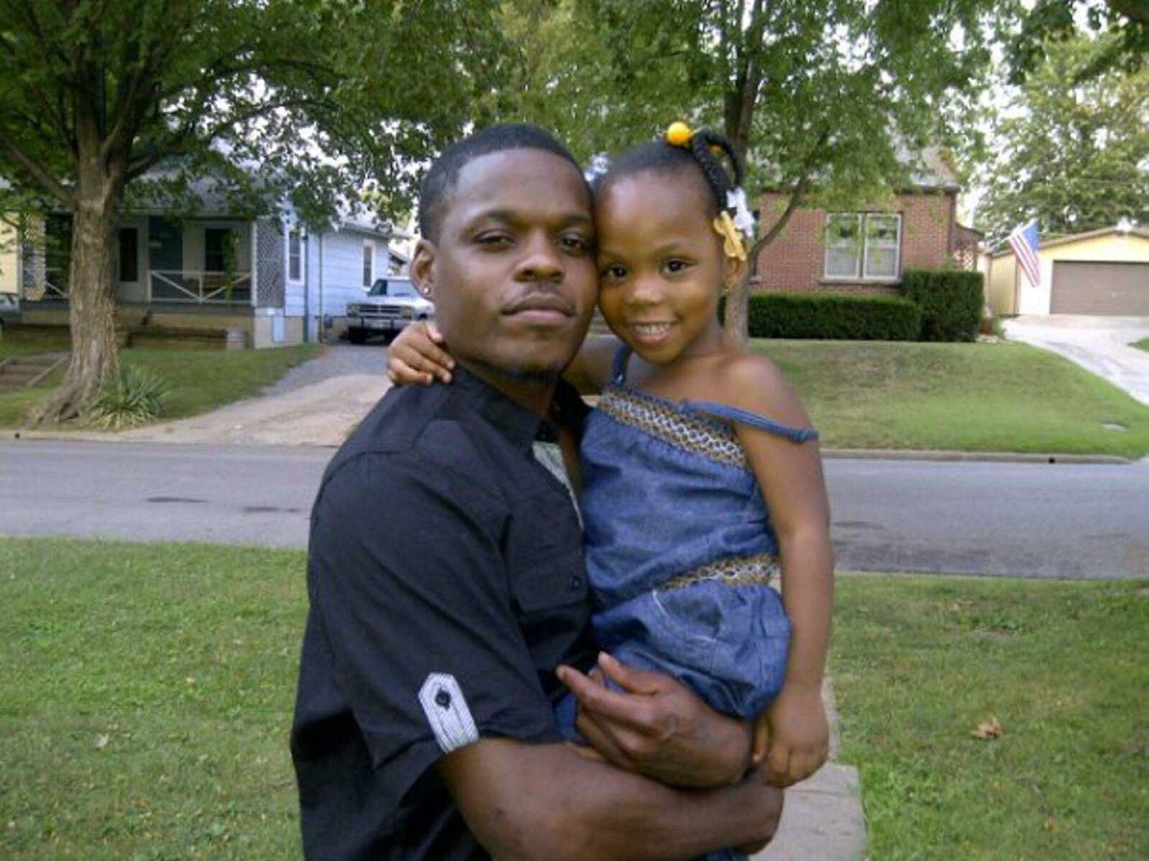 Brent Johnson poses for a photo with his daughter Brilyn Sides.