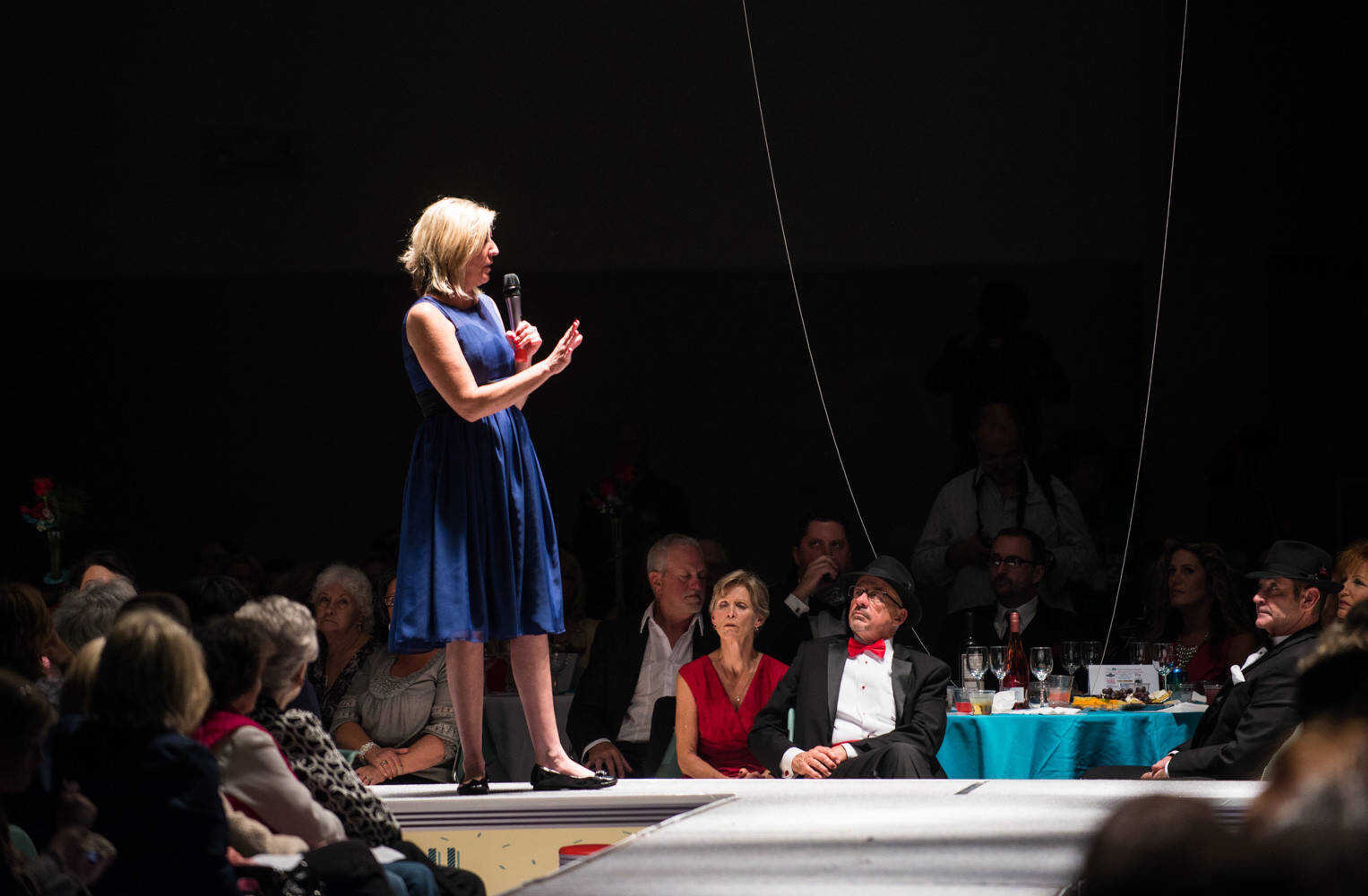 AARON EISENHAUER ~ photos@semissourian.com
Allison Leonard, director of Safe House for Women, speaks during the fifth annual VintageNOW fashion show, a fundraiser for Safe House for Women, at the Osage Centre on Friday, October 17, 2014.