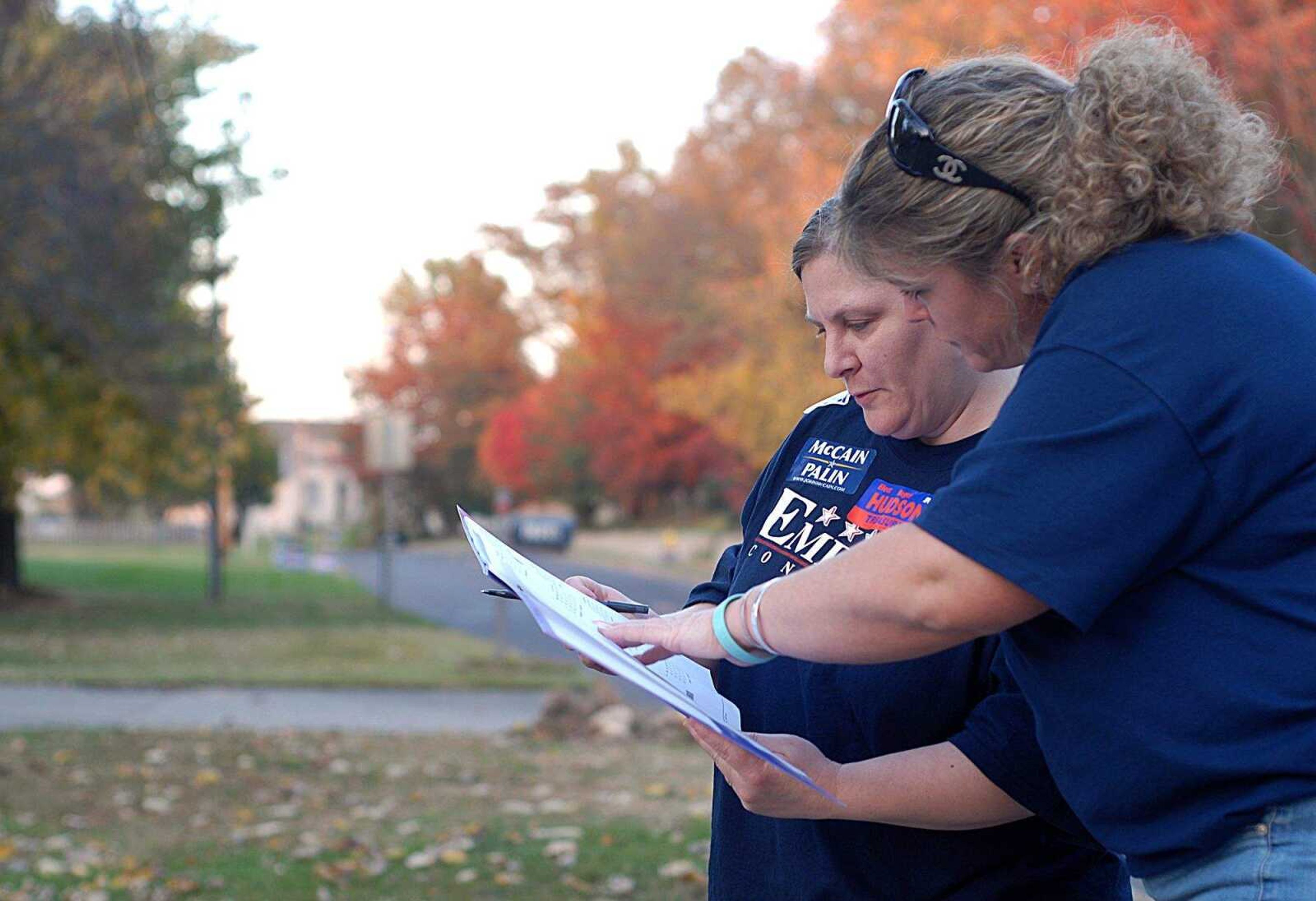 AARON EISENHAUER ~ aeisenhauer@semissourian.com
Lori Trump and Lisa Reitzel look at their list of Republican voters as they canvas a neighborhood on Cape Rock Drive making sure everyone has cast their vote.