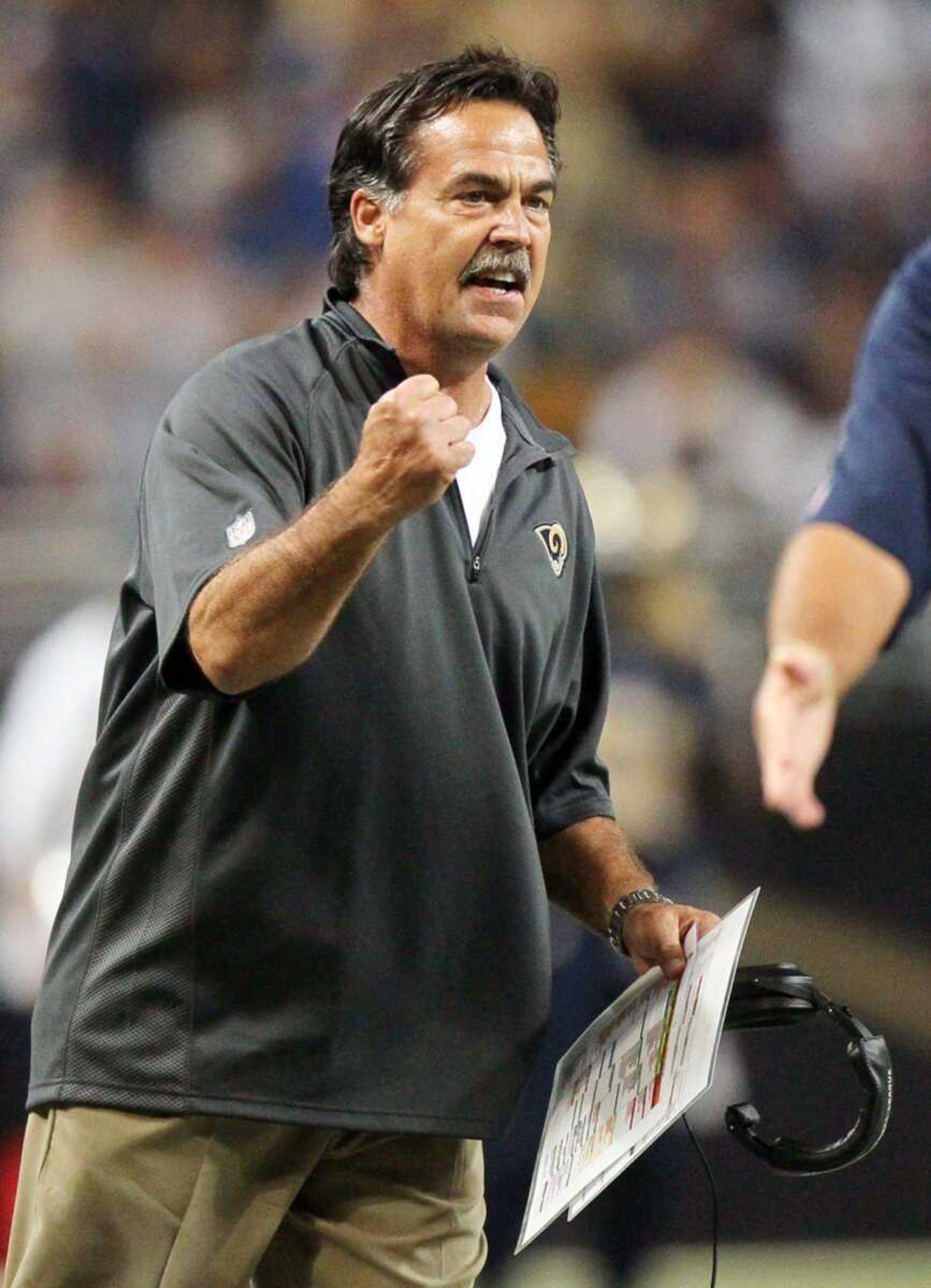 Rams coach Jeff Fisher reacts after his team scored on a two-point conversion against the Redskins in the fourth quarter Sunday. (Chris Lee ~ St. Louis Post-Dispatch)