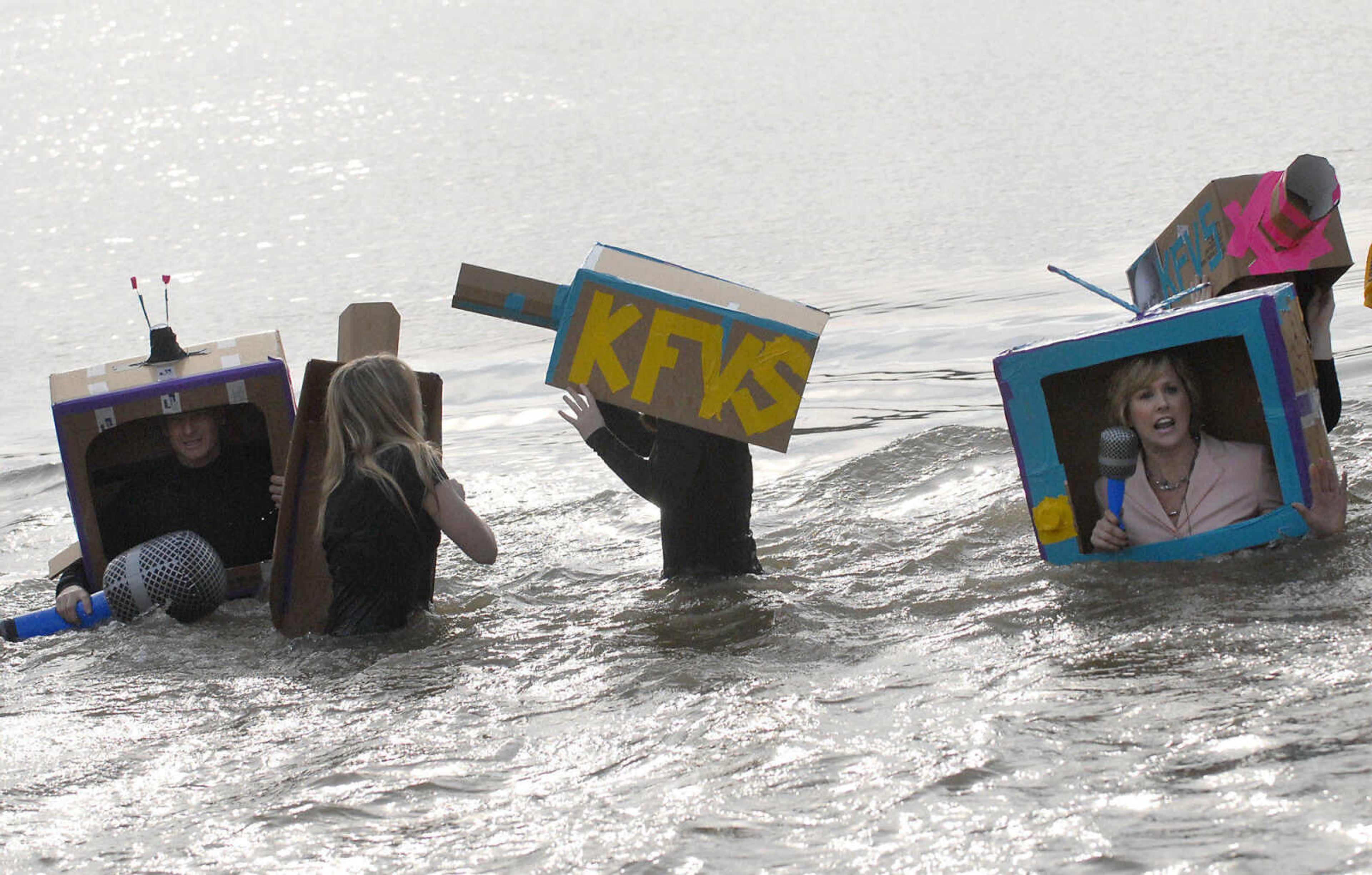 KRISTIN EBERTS ~ keberts@semissourian.com

Plungers brave the water during the 2012 Polar Plunge at the Trail of Tears State Park's Lake Boutin on Saturday, Feb. 4, 2012.