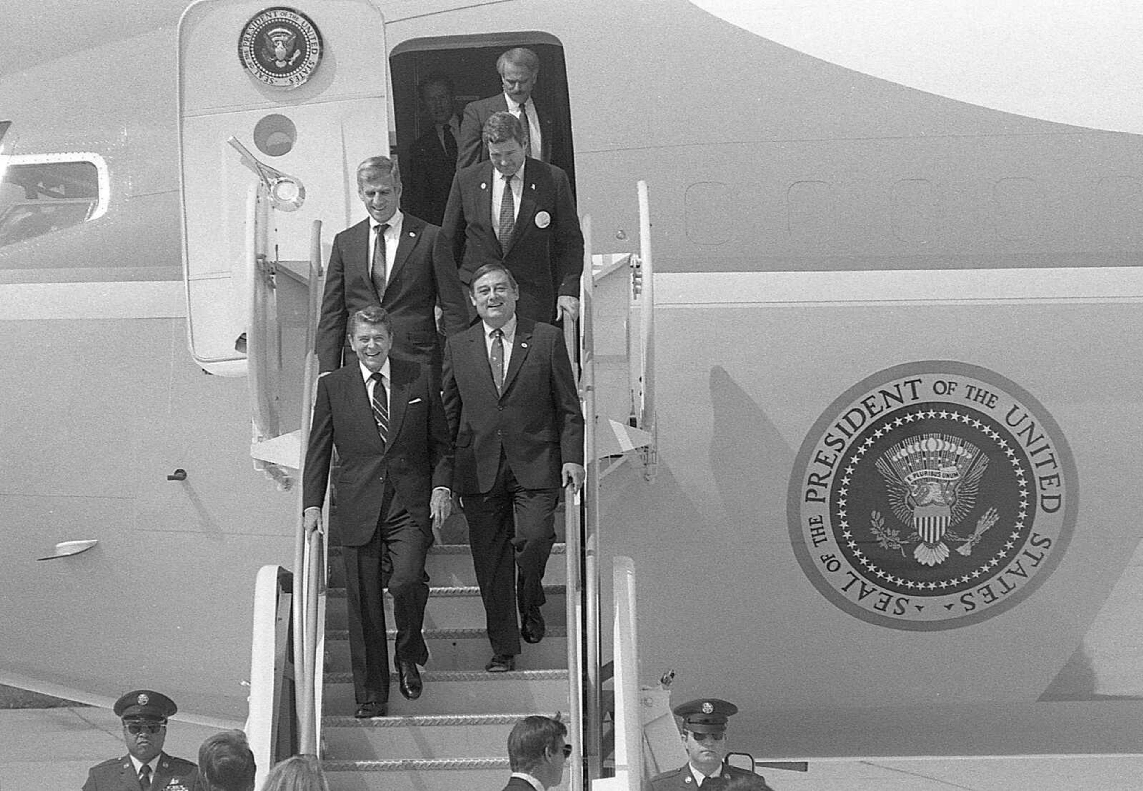 Published Sept. 14, 1988.
President Ronald Reagan arrived in Cape Girardeau this morning aboard Air Force One, the presidential jet. Coming off the plane with the president at Cape Girardeau Municipal Airport were Congressman Bill Emerson of Cape Girardeau, front right; Sen. John Danforth, rear left; and Sen. Christopher bond, rear right. (Fred Lynch ~ Southeast Missourian archive)