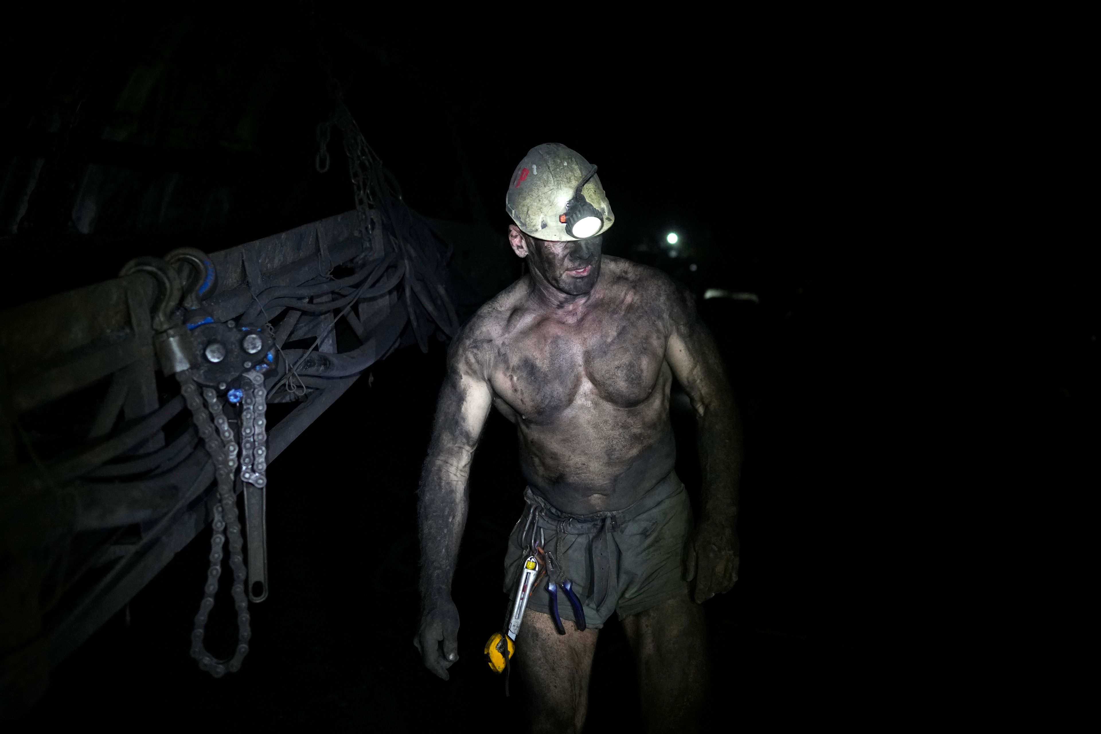 A miner walks in a shaft of the CSM coal mine in Stonava, Czech Republic, Monday, Oct. 14, 2024. (AP Photo/Petr David Josek)