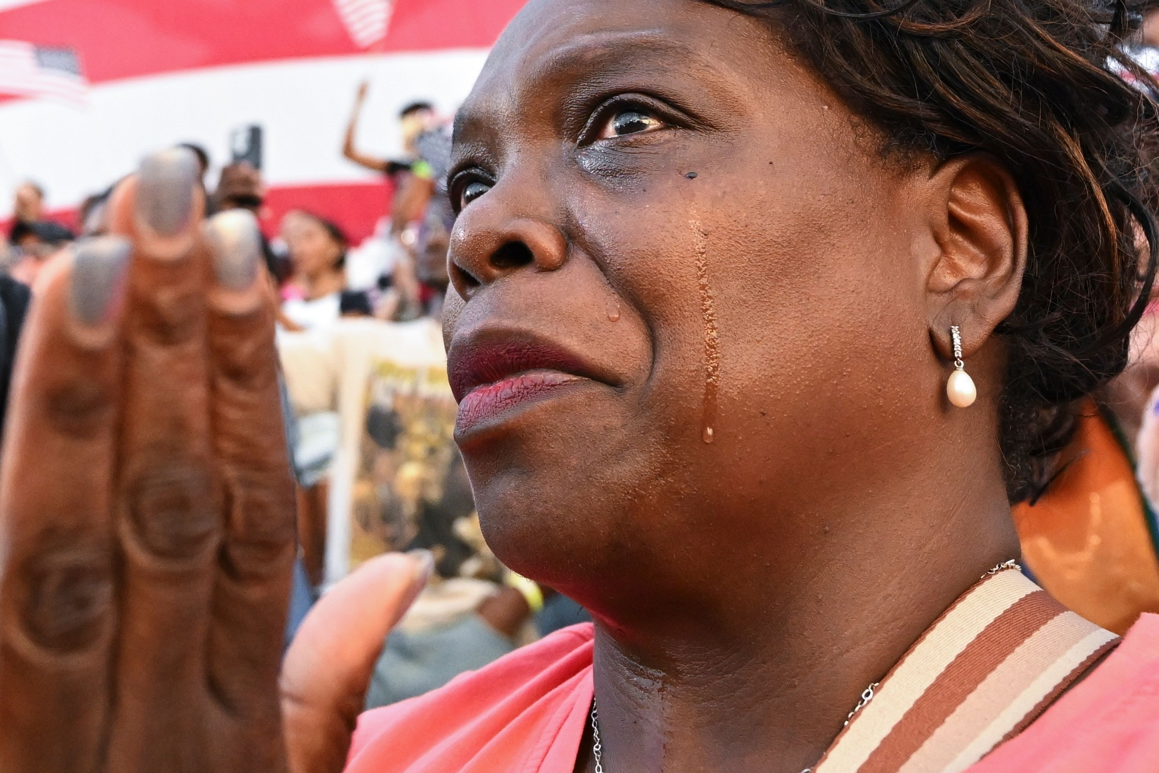 A supporter of Vice President Kamala Harris reacts at her concession speech for the 2024 presidential election on the campus of Howard University in Washington, Wednesday, Nov. 6, 2024. (AP Photo/Terrance Williams)