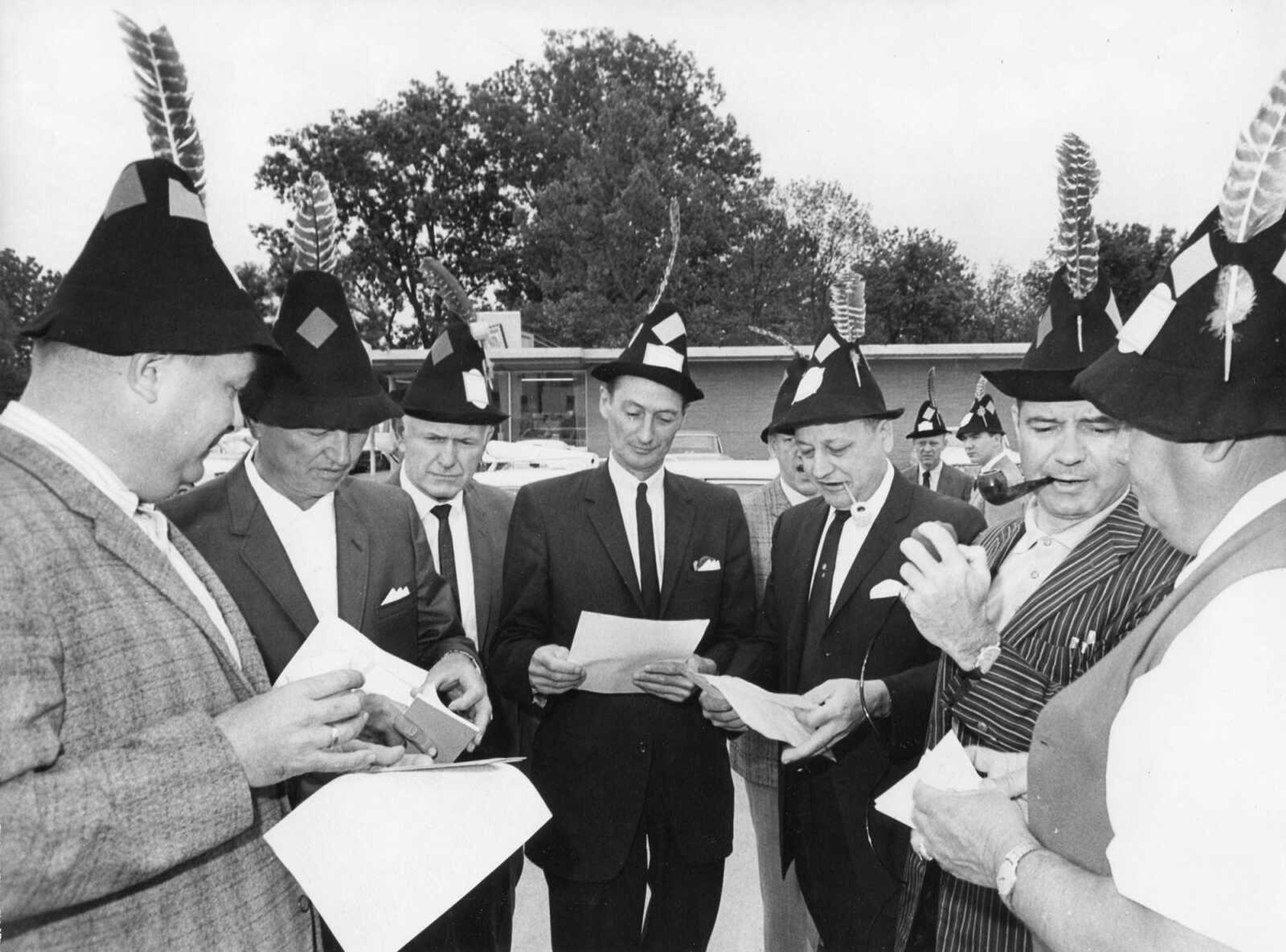 Published May 11, 1965.
The Chamber of Commerce began its annual membership drive, employing a hillbilly theme. Here, their mountain hats in place, ready to go were, from left, E.C. Younghouse, John L. Wescoat, Edwin A. Blumenberg, Garrett E. Seifert, Vernon A. Auer, Bill Royce and Virgil A. Baker. Divided into teams, the participants had breakfast together and then went out to business firms to make contacts for members. (Southeast Missourian archive photo)