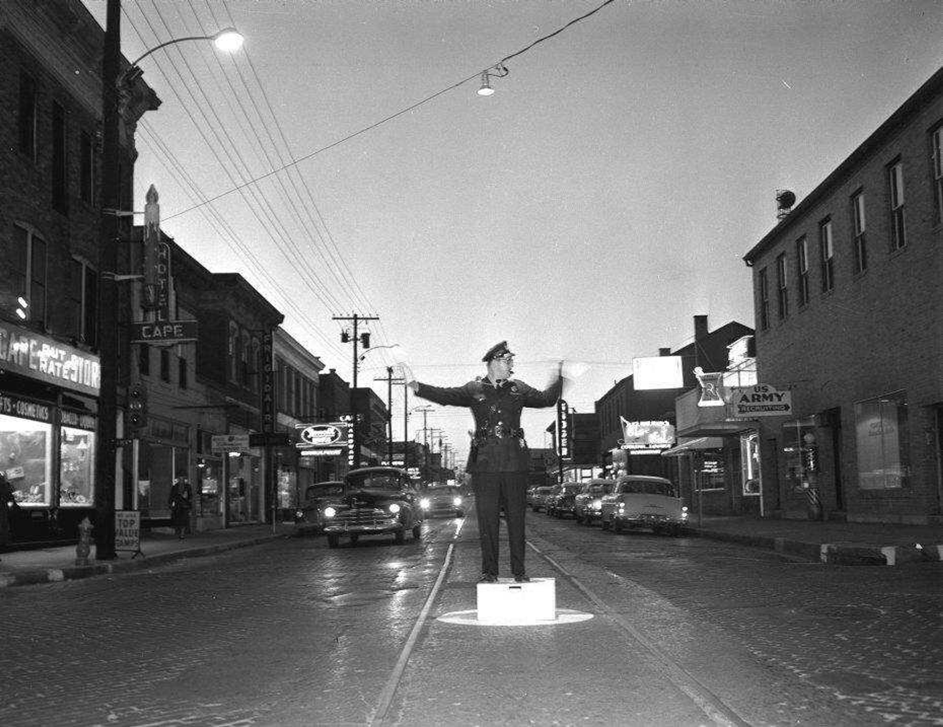 SOUTHEAST MISSOURIAN ~ photos@semissourian.com
File photo taken by G.D. Fronabarger
A Cape Girardeau police officer directs traffic at the intersection of Broadway and Sprigg in the 1950's.