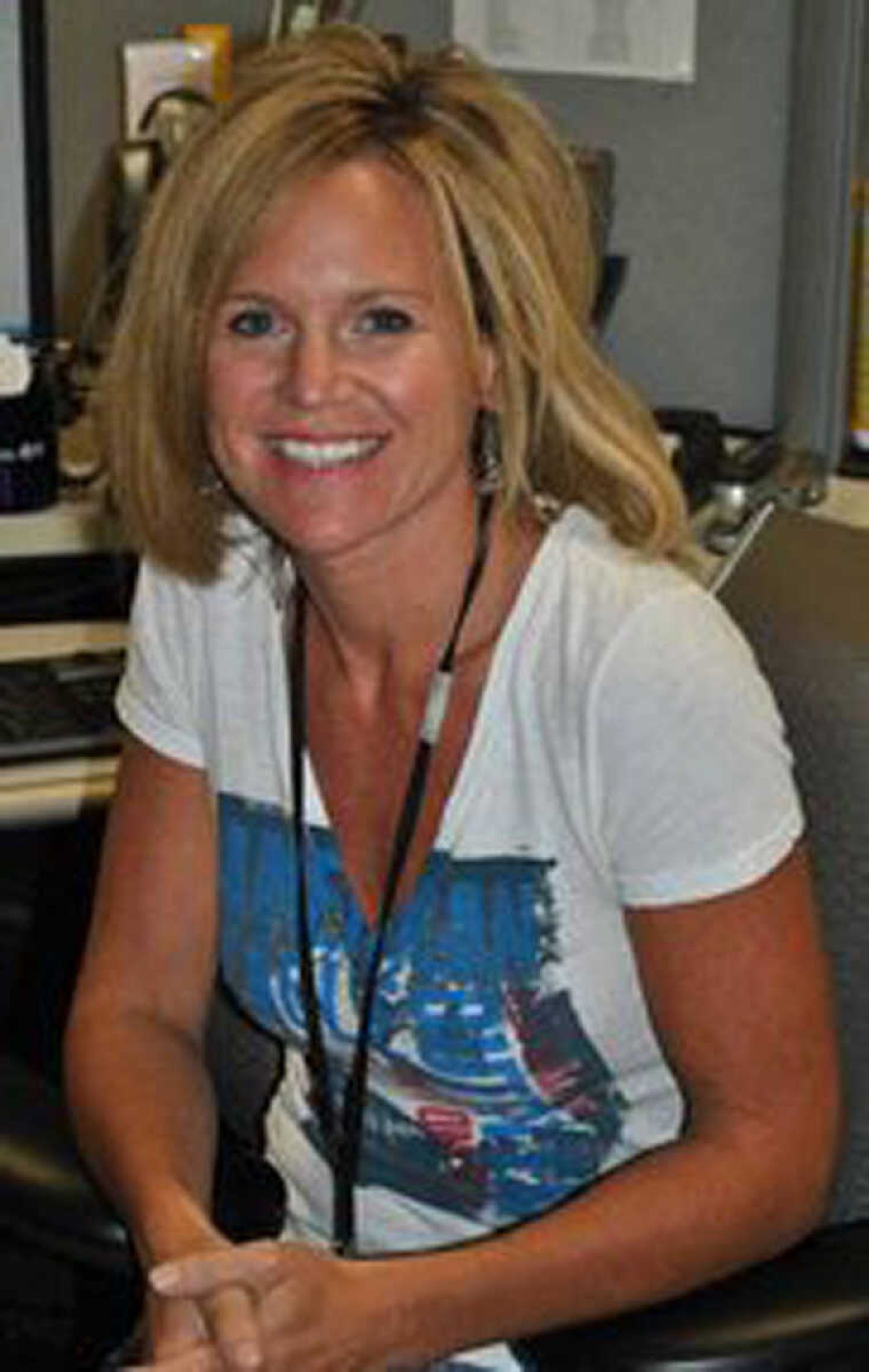 This 2010 photo provided by Laura Helbig shows Jacque Waller, who disappeared on June 1, 2011. The husband of Jacque Waller, Clay Waller, 41, was charged with first-degree murder in the death of Jacque on Monday, April 23, 2012, even though his estranged wife's body has not been found. (AP Photo/Laura Helbig)