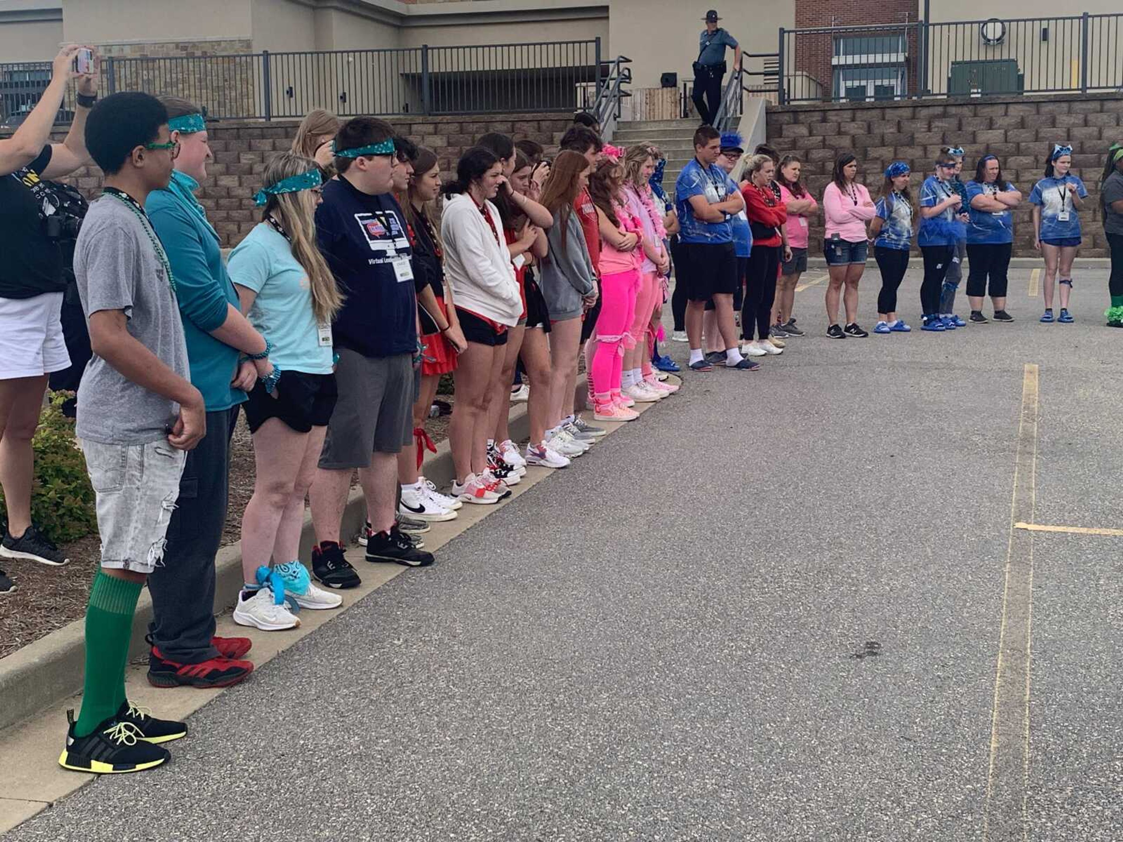 Students from six high schools watch the mock DWI presentation during the youth traffic safety leadership training conference, which took place from June 9 to 11. Each student wore a team color during the conference to represent their school.&nbsp;