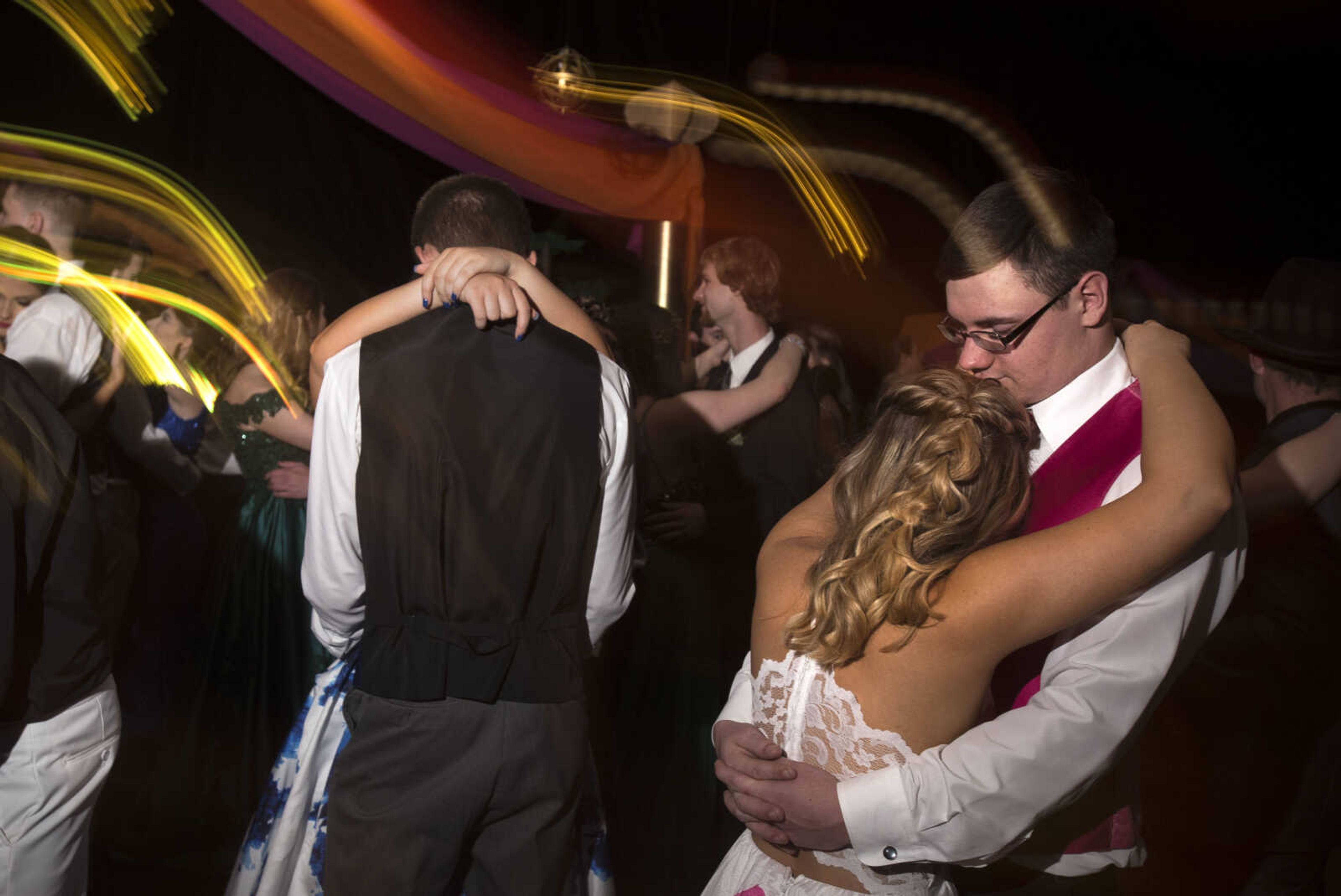 Blake Davis and Mariah McAlister slow-dance during prom Saturday, April 6, 2019, at Kelly High School in Benton.