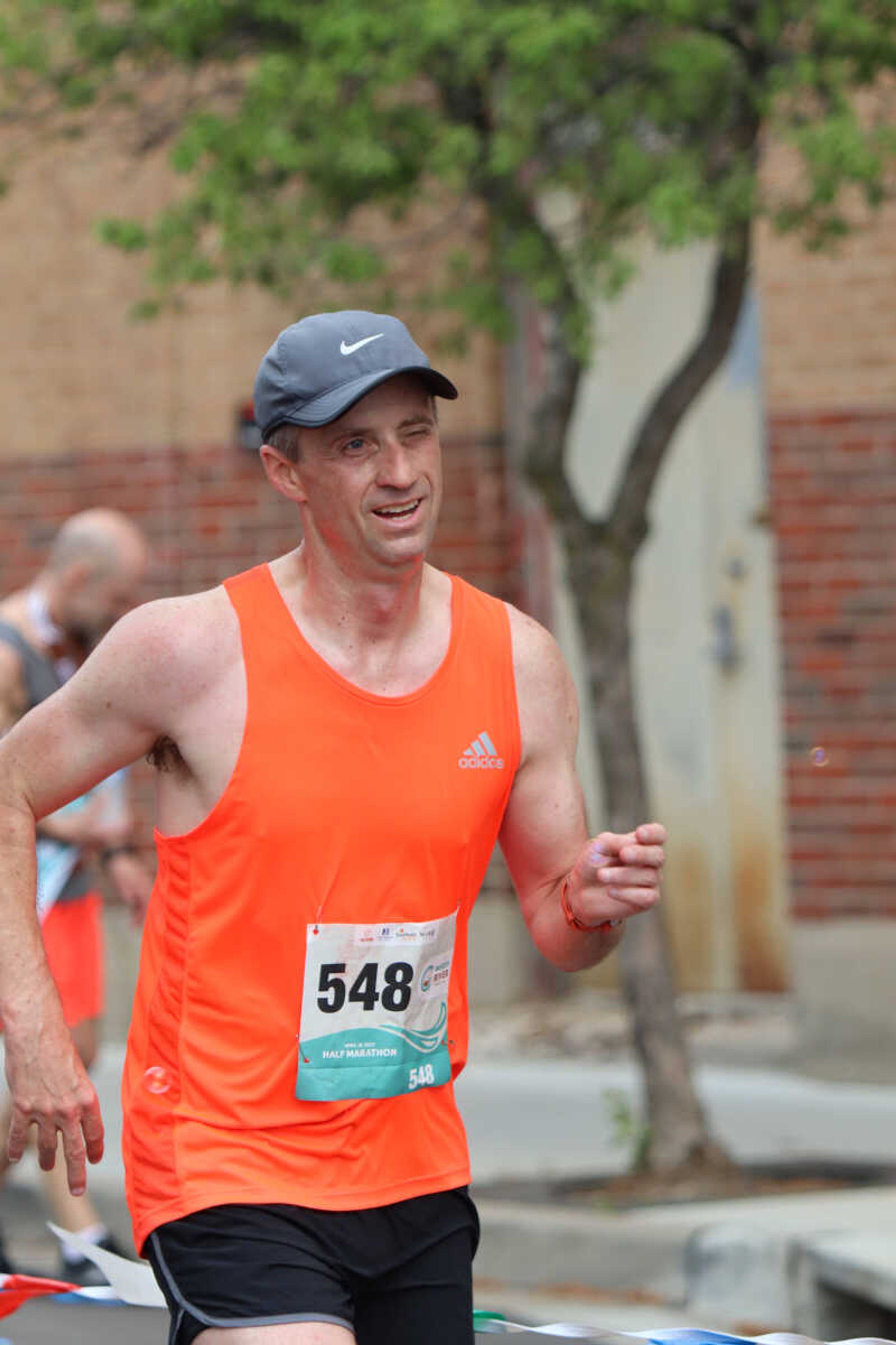 Half marathon runner Steve Desmond making his last steps to the finish line.