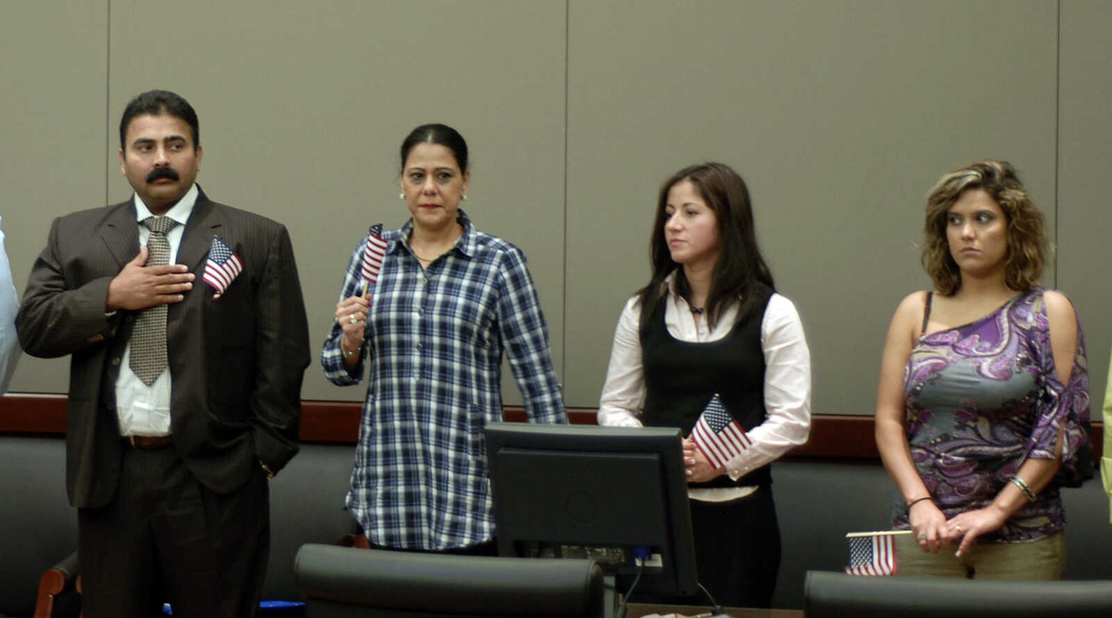 Bob Miller~bmiller@semissourian.com
Eighteen people become citizens of the United States of America Monday, April 25, 2011 during the Naturalization Ceremony at the Rush Hudson Limbaugh, Sr. United States Courthouse in Cape Girardeau.