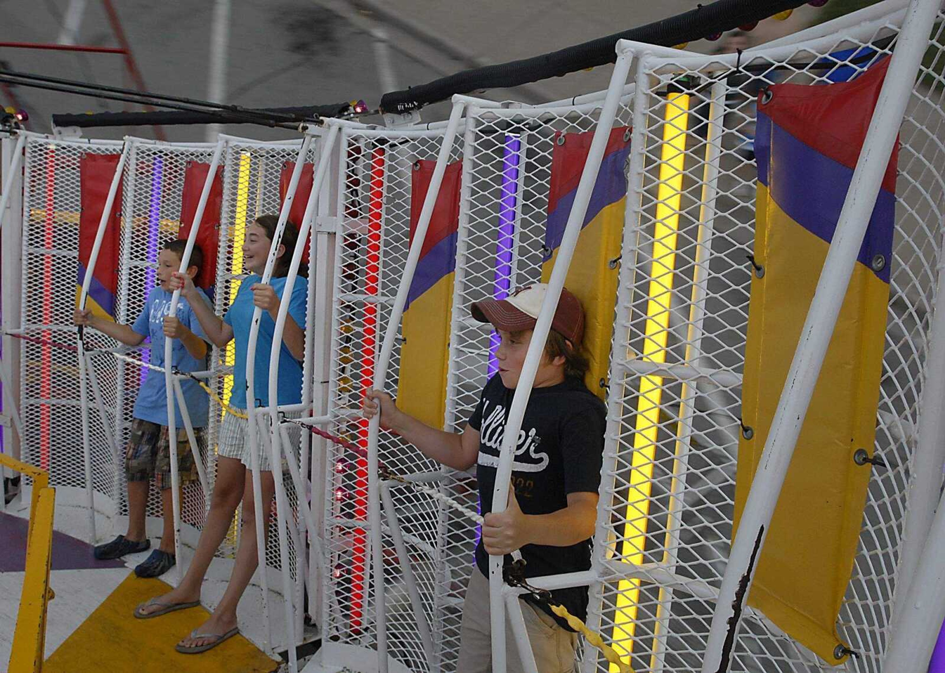 KIT DOYLE ~ kdoyle@semissourian.com
Siblings Brandon Hendrix, 10, left, and older sister Brooke, 12, rode the Vortex Friday, July 25, 2008, at Jackson Homecomers.