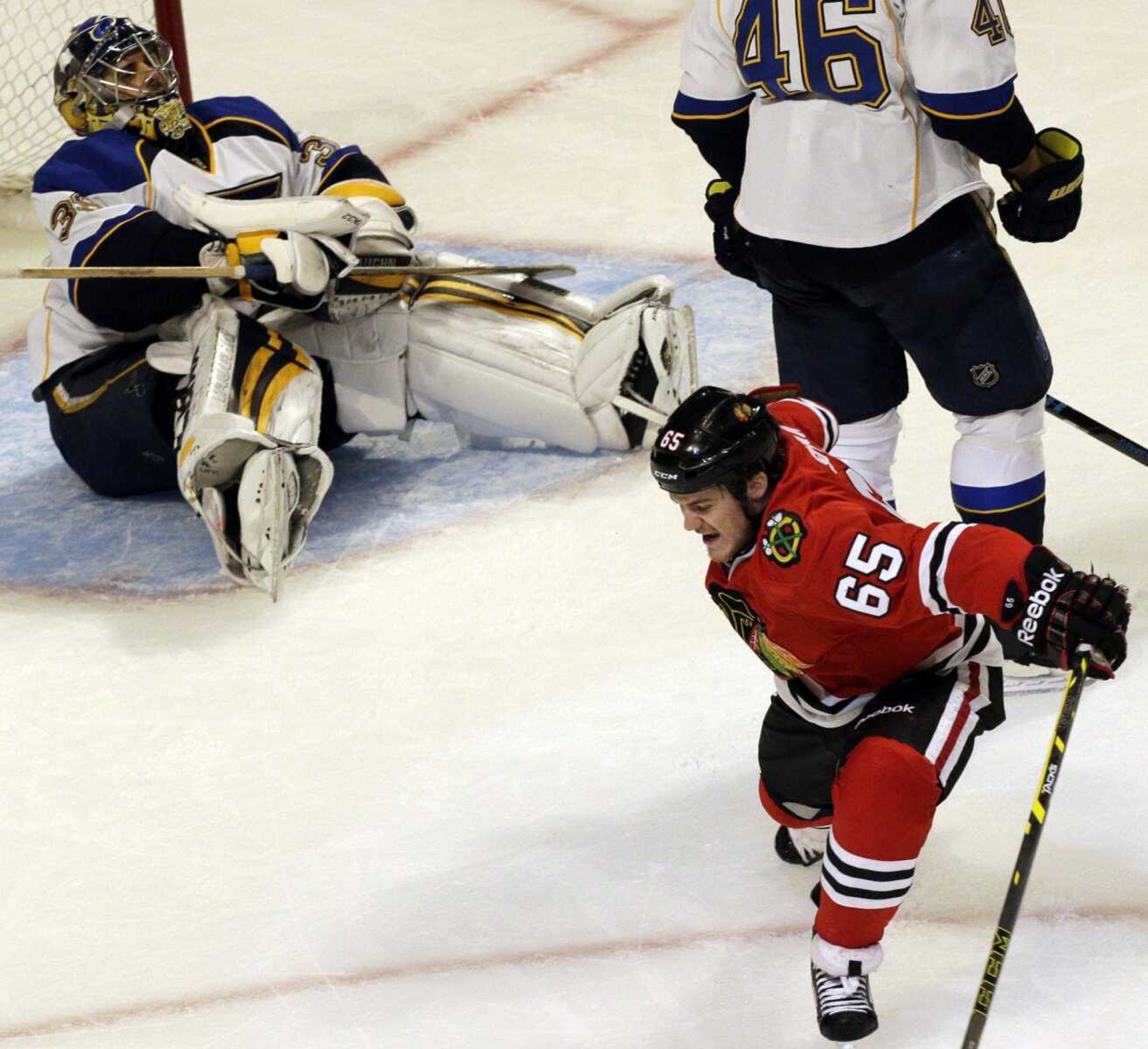 The Blackhawks&#8217; Andrew Shaw celebrates after scoring against Blues goalie Ryan Miller during the third period in Game 6 of their NHL first-round playoff series Sunday in Chicago. The Blackhawks won 5-1 to eliminate the Blues. (Nam Y. Huh ~ Associated Press)