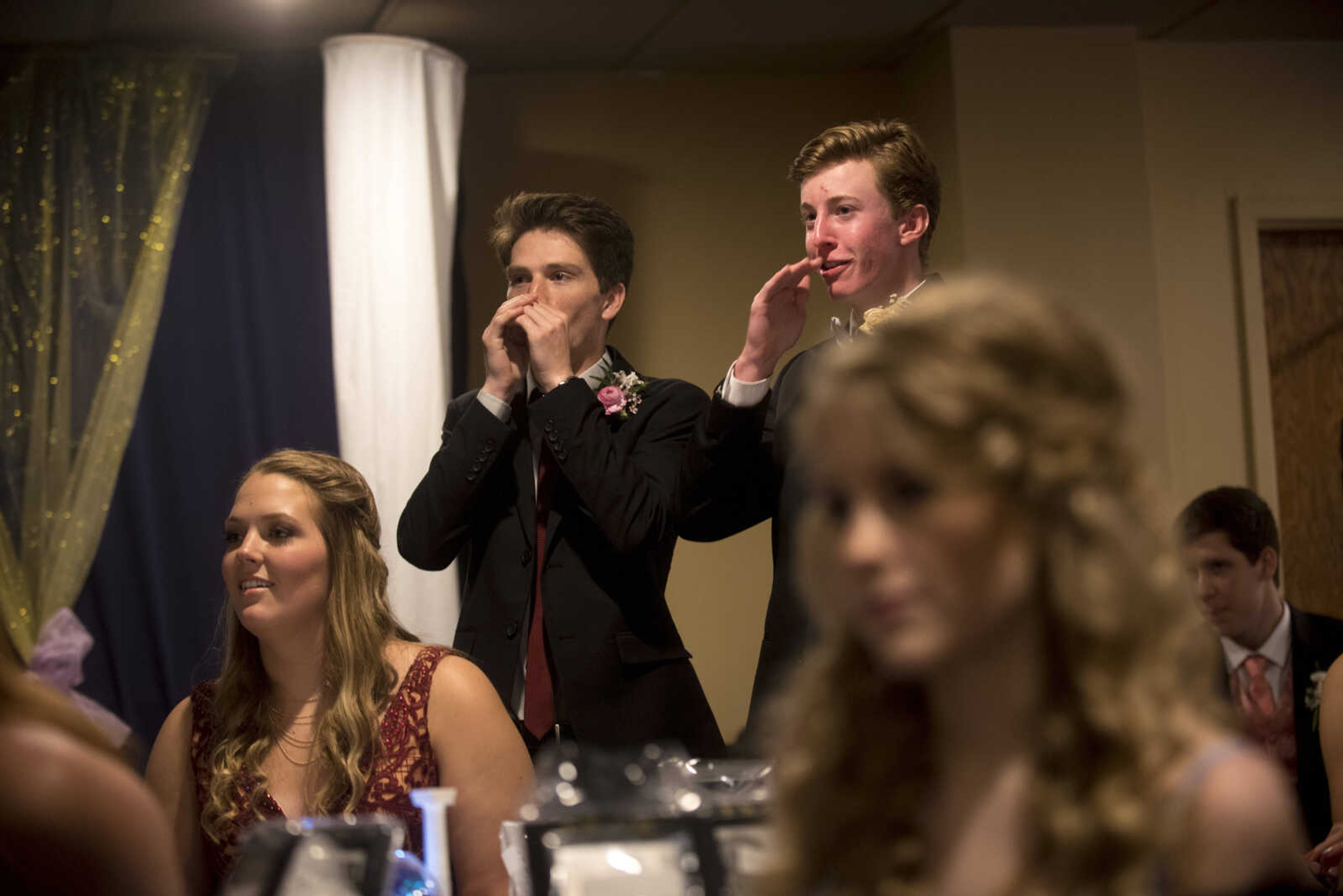 Students cheer on the prom court during the Saxony Lutheran prom Saturday, April 22, 2017 at the Elk's Lodge in Cape Girardeau.