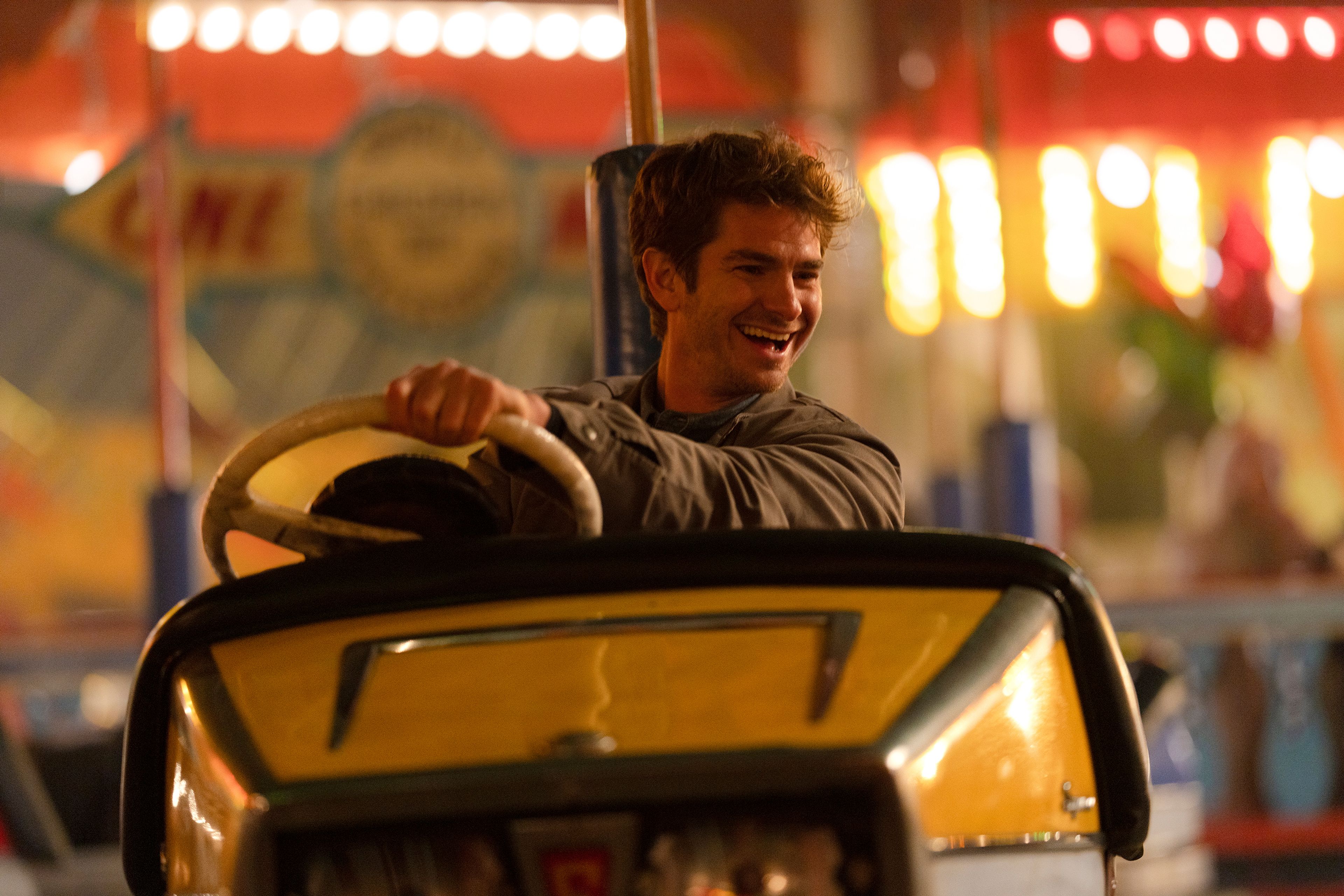 This image released by A24 shows Andrew Garfield in a scene from "We Live In Time." (Peter Mountain/A24 via AP)