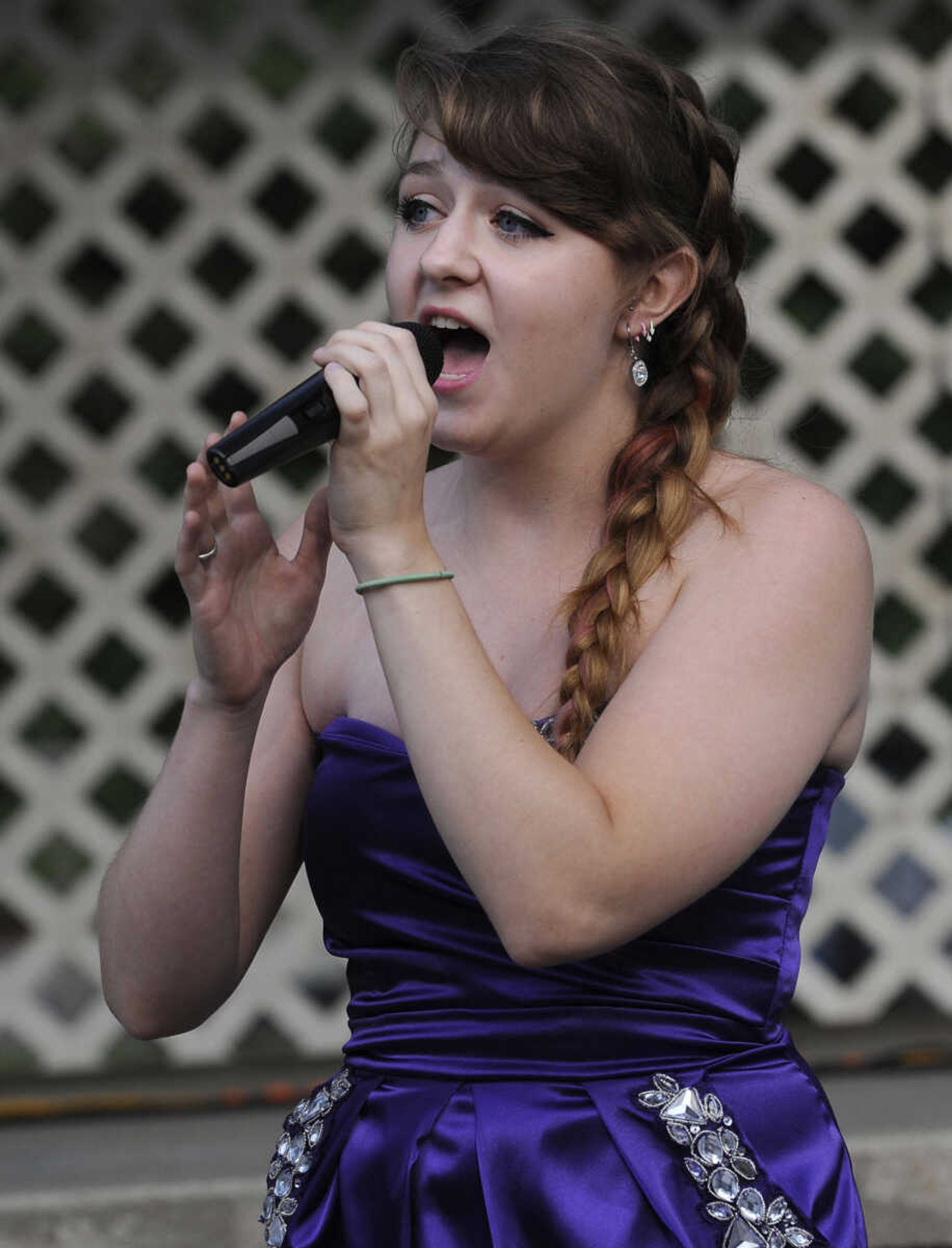 FRED LYNCH ~ flynch@semissourian.com
Alyssa Robinson performs "As If We Never Said Goodbye" in the Heartland Talent Showcase at German Days on Saturday, Aug. 9, 2014 at Frisco Park in Chaffee, Missouri.