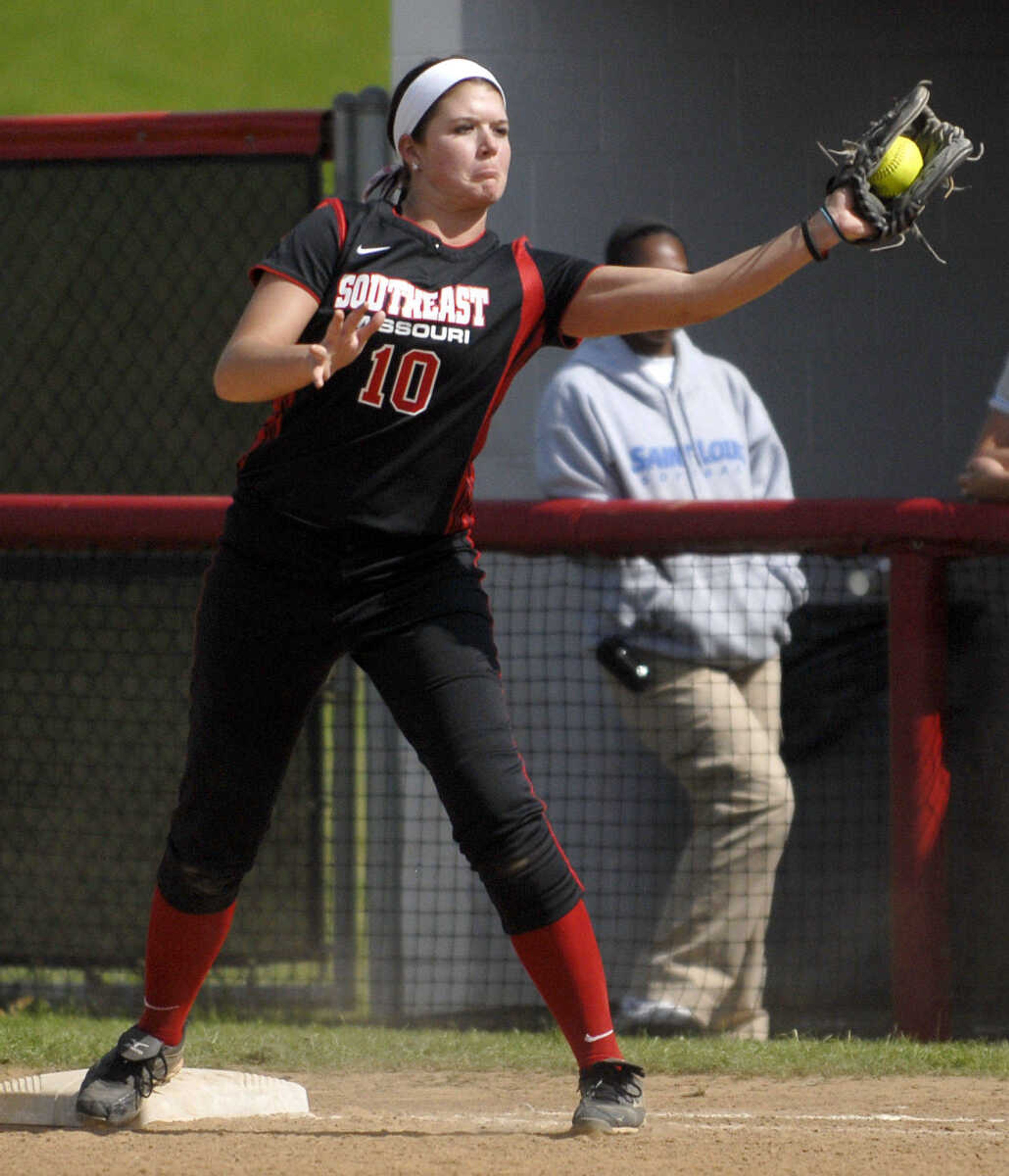 LAURA SIMON~lsimon@semissourian.com
Southeast first baseman Taylor Cowan makes the out at first in the fourth inning during the first game of a double-header against Saint Louis University Wednesday, May 4, 2011 at the Southeast Softball Complex.