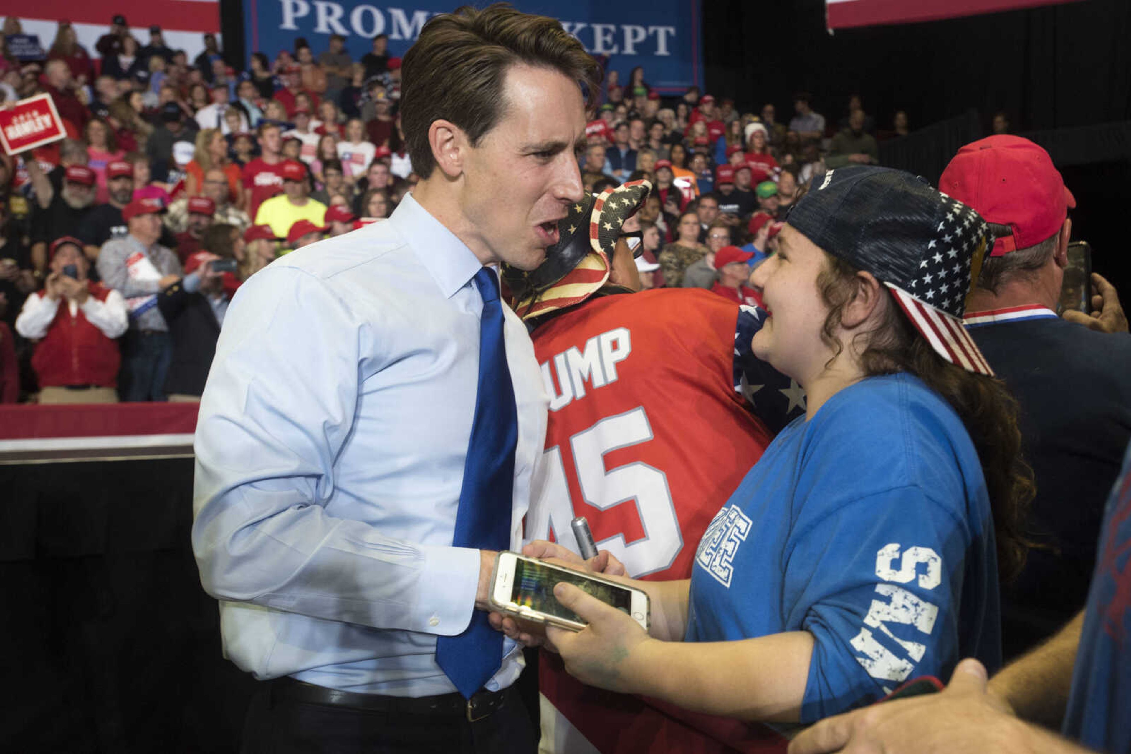 Missouri Attorney General and U.S. Senate candidate Josh Hawley shakes hands with Maelee Dover, of Anna, Illinois, during a Make America Great Again rally Monday, Nov. 5, 2018, at the Show Me Center in Cape Girardeau.