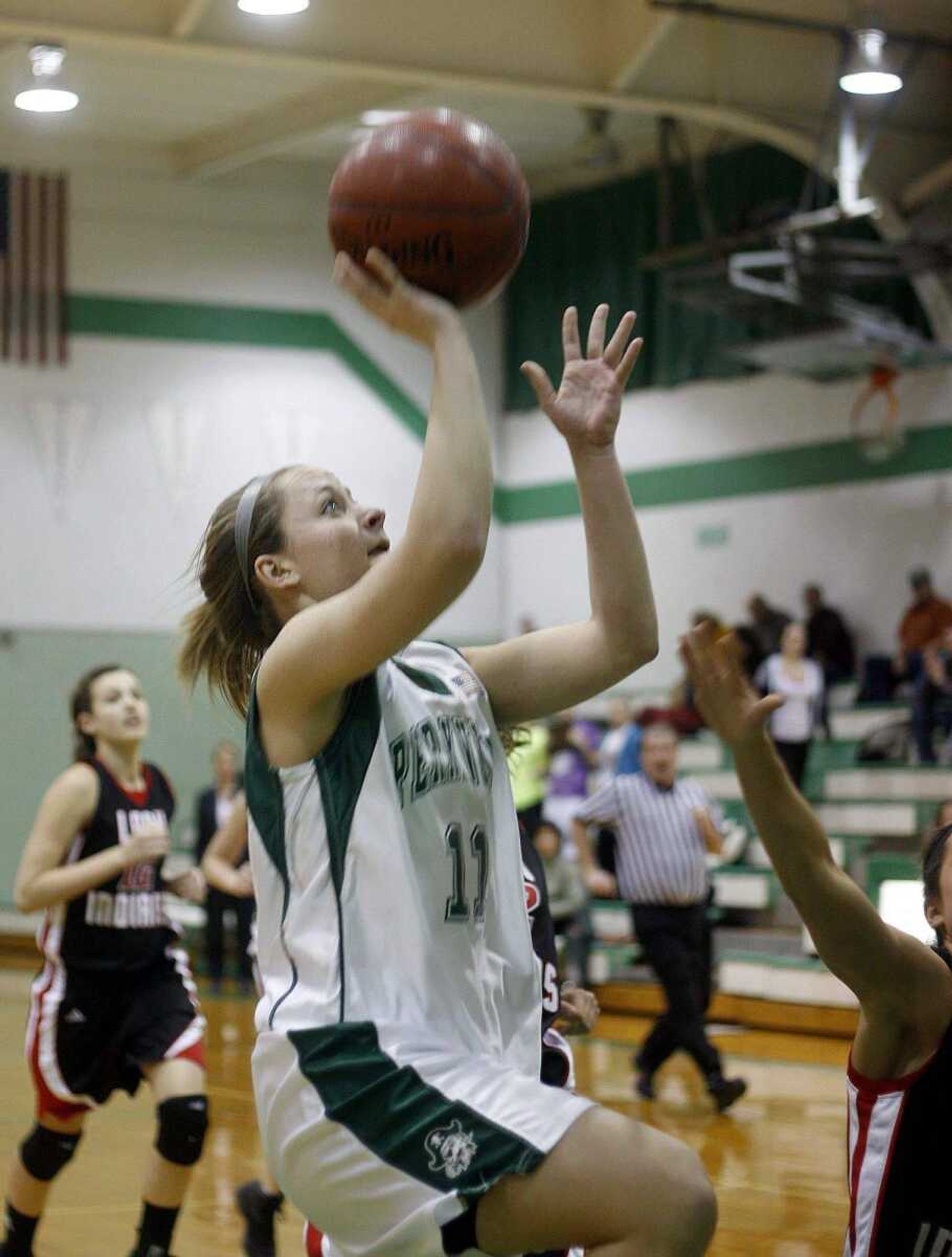 ELIZABETH DODD ~ edodd@semissourian.comPerryville's Ava Johnson scores two points in a game against Jackson.