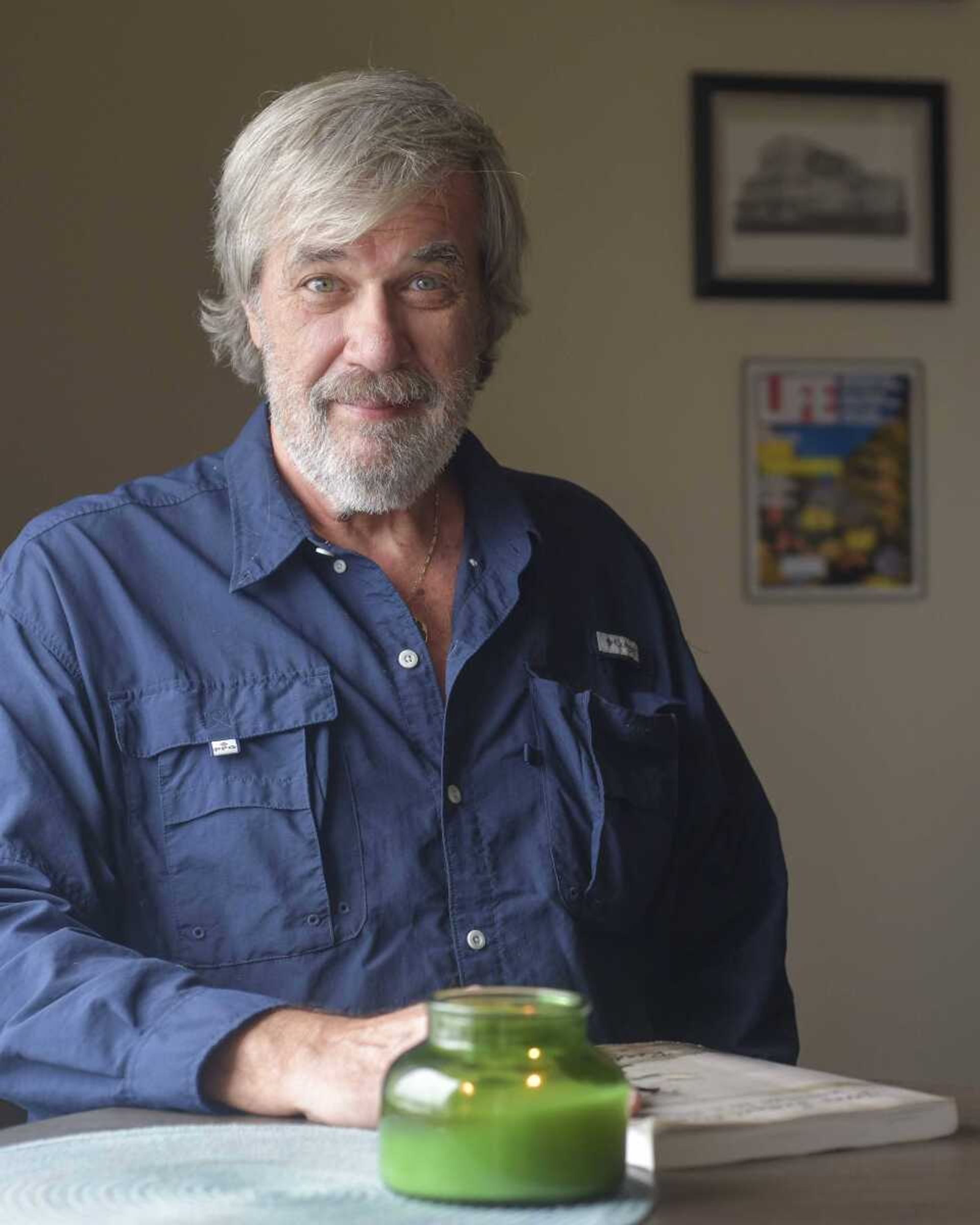 Author Randy Barnhouse poses for a portrait at his home in Cape Girardeau. 