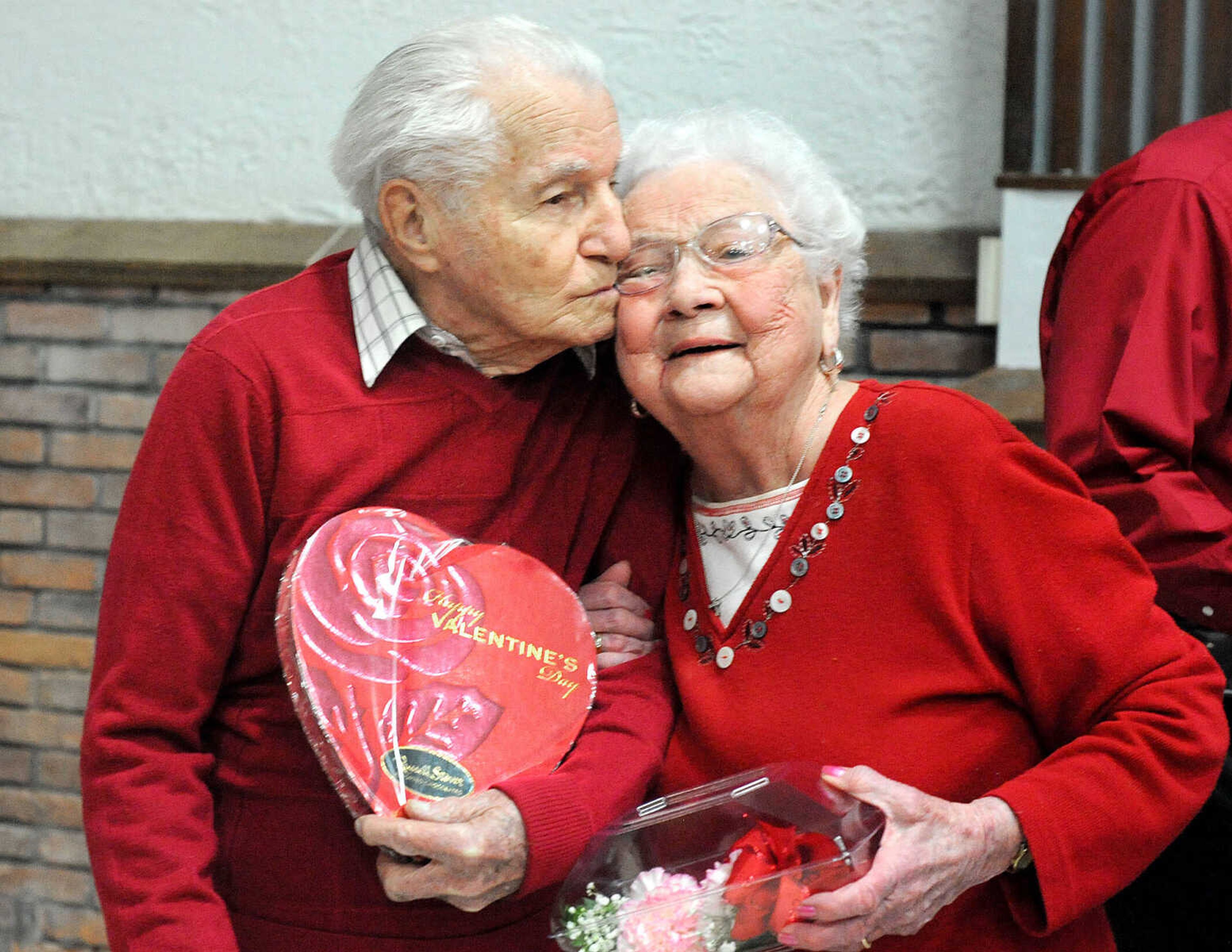 LAURA SIMON ~ lsimon@semissourian.com

Woody Proctor gives his wife of 72 years, Katy, a peck on the cheek, Friday, Feb. 14, 2014, during the annual Seniors' Valentine's Party. The annual party, presented by Schnucks and News Radio 960 KZIM, featured music from Mike Dumey and Robyn Hosp.