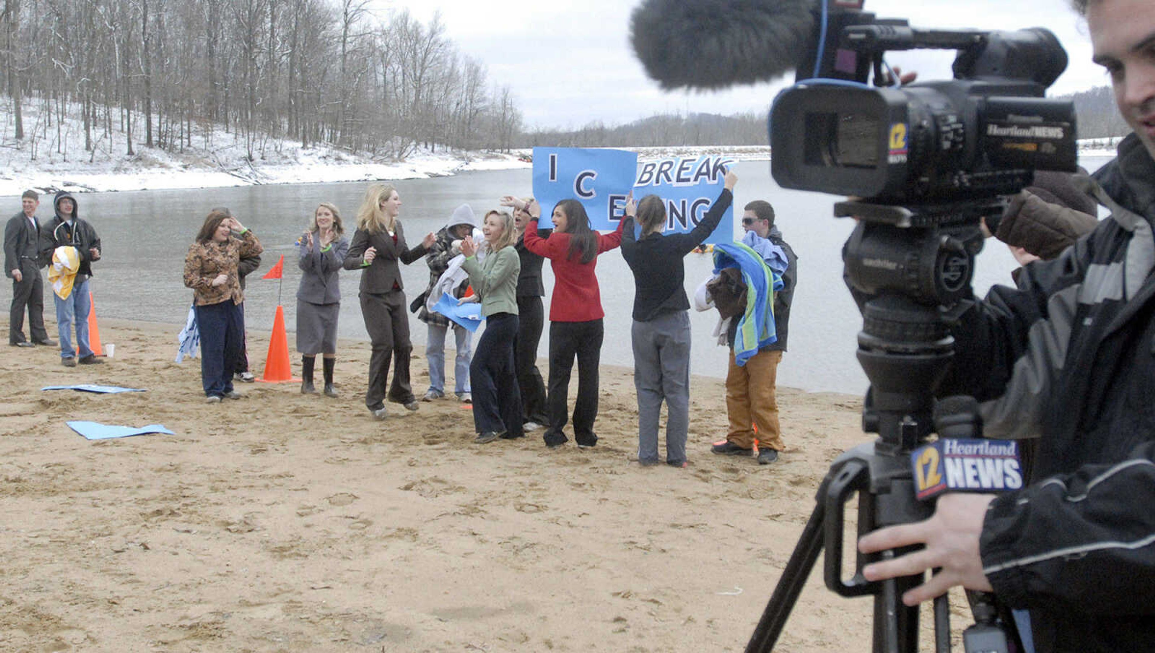 LAURA SIMON~lsimon@semissourian.com
Part of the KFVS12 news team prepare to take the plunge into Lake Boutin Saturday, February 6, 2010 during the Polar Bear Plunge at Trail of Tears State Park.