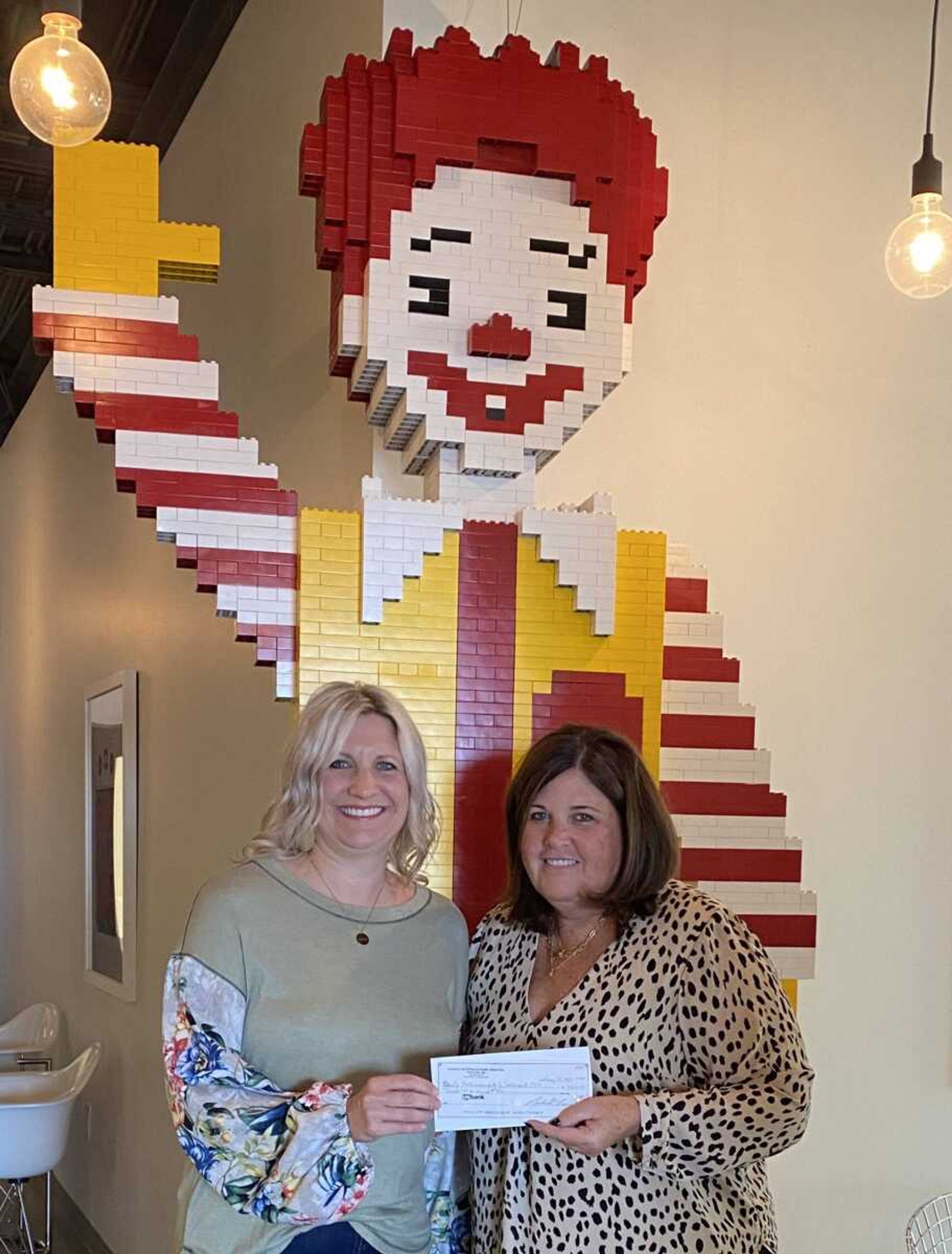 Pictured, Becki Arends, District Manager for Junior Achievement in Southeast Missouri, and Cheryl Farrow, Director of Operations for McDonalds.