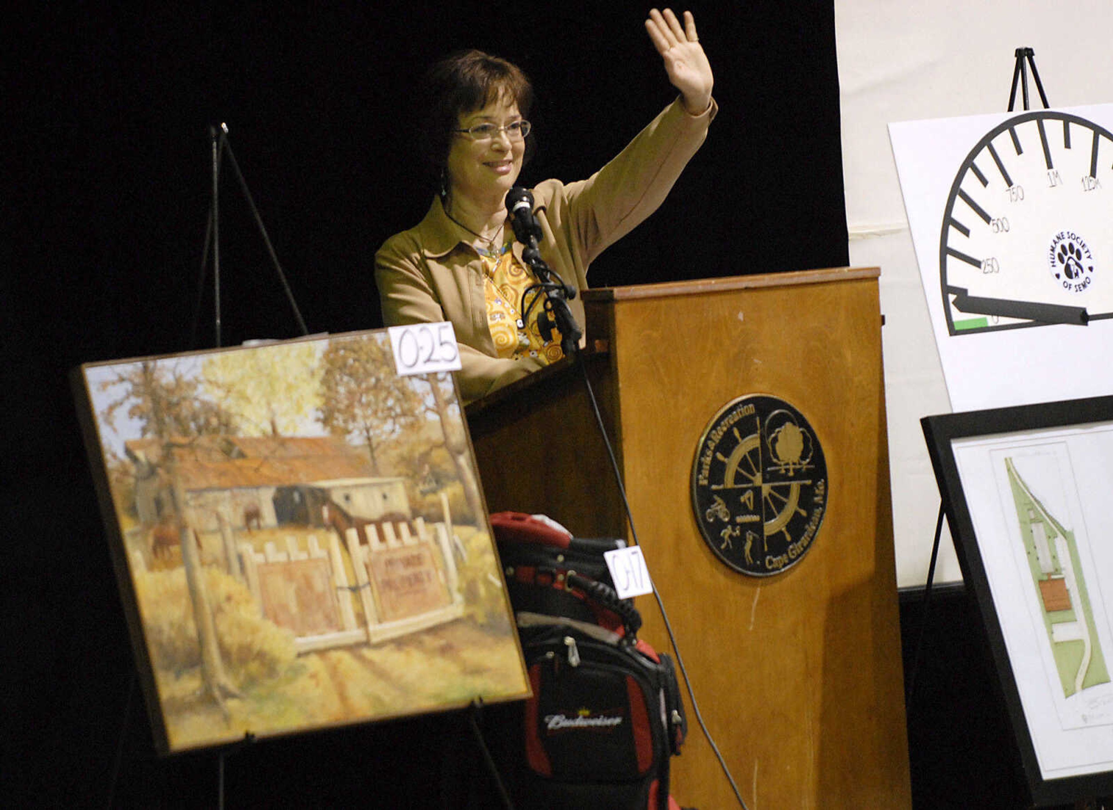 KRISTIN EBERTS ~ keberts@semissourian.com

Emcee Jhan Snyder welcomes guests during the Humane Society of Southeast Missouri's 30th annual Dinner and Auction titled "Tales of Tails" on March 26, 2011, at the A.C. Brase Arena in Cape Girardeau. The event included dinner, awards, raffles and silent and oral auctions with proceeds benefitting the Humane Society.