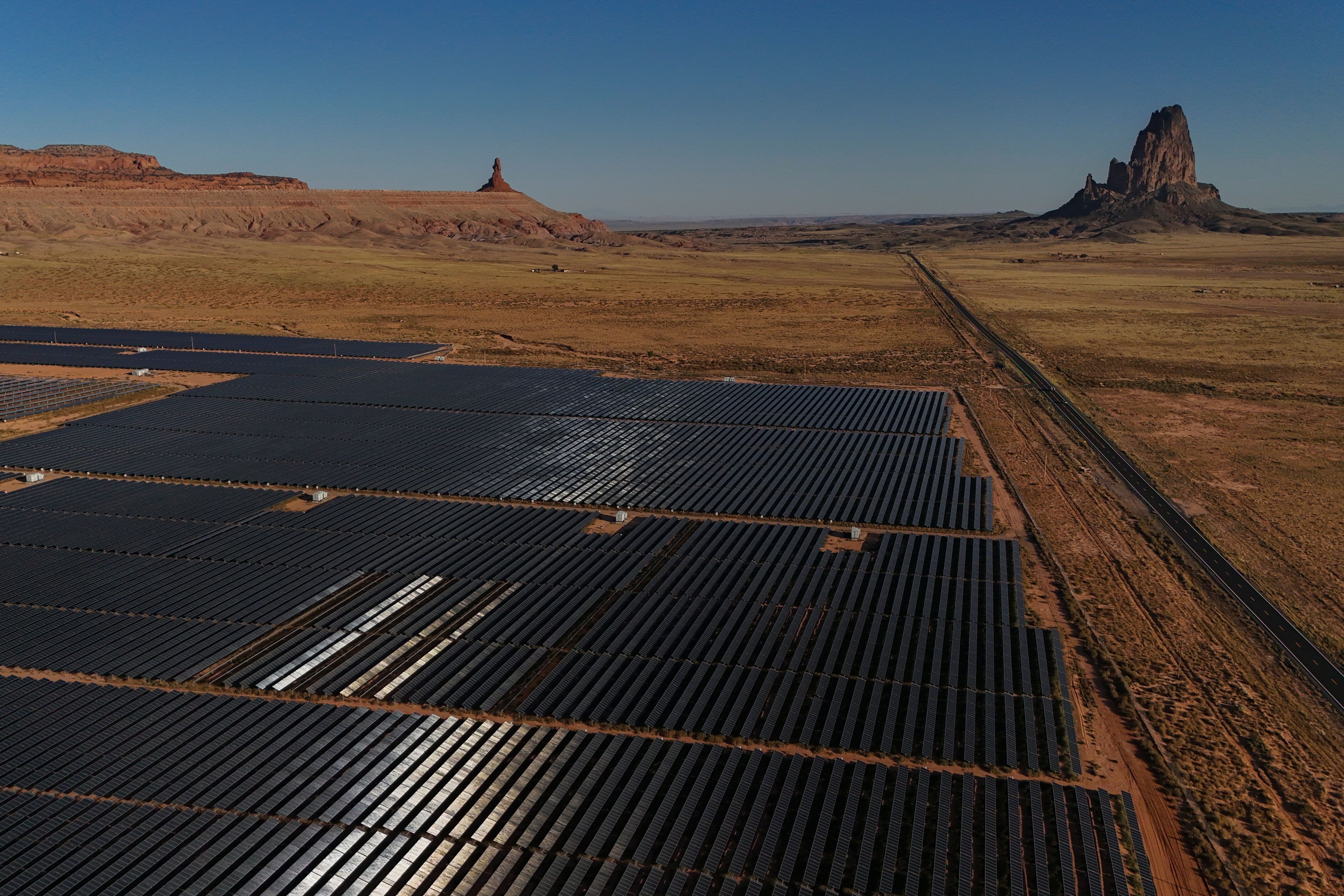 Solar panels operate, Thursday, Oct. 10, 2024, at the Kayenta Solar Plant in Kayenta, Ariz. (AP Photo/Joshua A. Bickel)