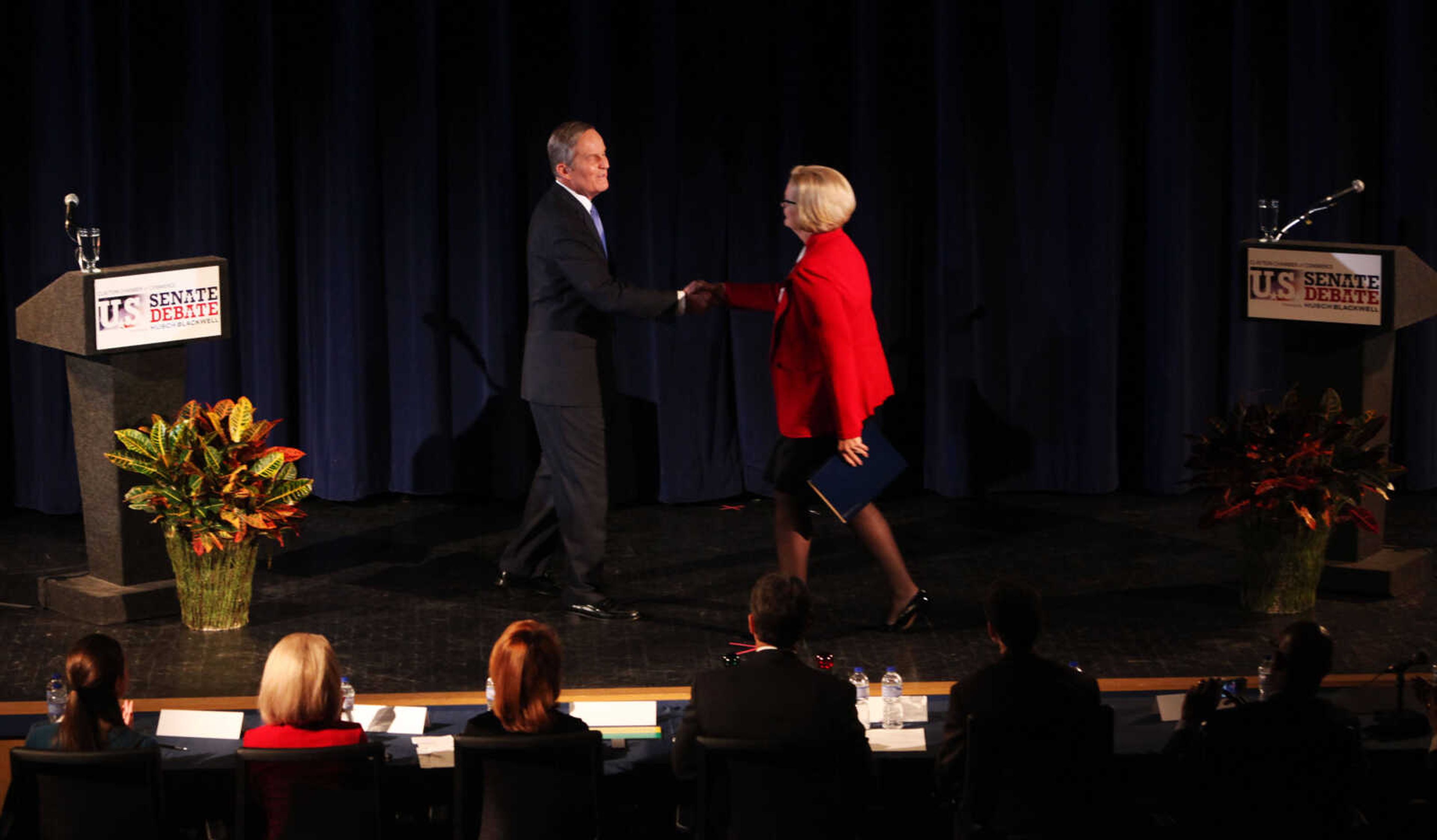 Republican Rep. Todd Akin and Democratic Sen. Claire McCaskill shake hands before the start of the second debate in the Missouri Senate race Thursday, Oct. 18, 2012, in Clayton, Mo. (AP Photo/Emily Rasinski)